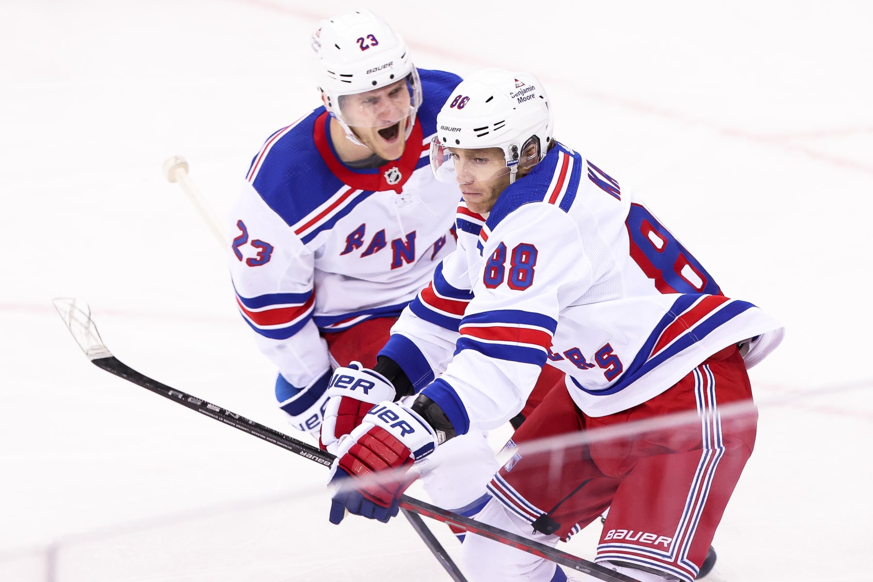 NEWARK, NJ - APRIL 20: New York Rangers right wing Patrick Kane (88) celebrates with New York Rangers defenseman Adam Fox (23) after scoring a goal during the National Hockey League game between the New York Rangers and the New Jersey Devils on April 20, 2023 at Prudential Center in Newark, NJ. (Photo by Andrew Mordzynski/Icon Sportswire via Getty Images)
