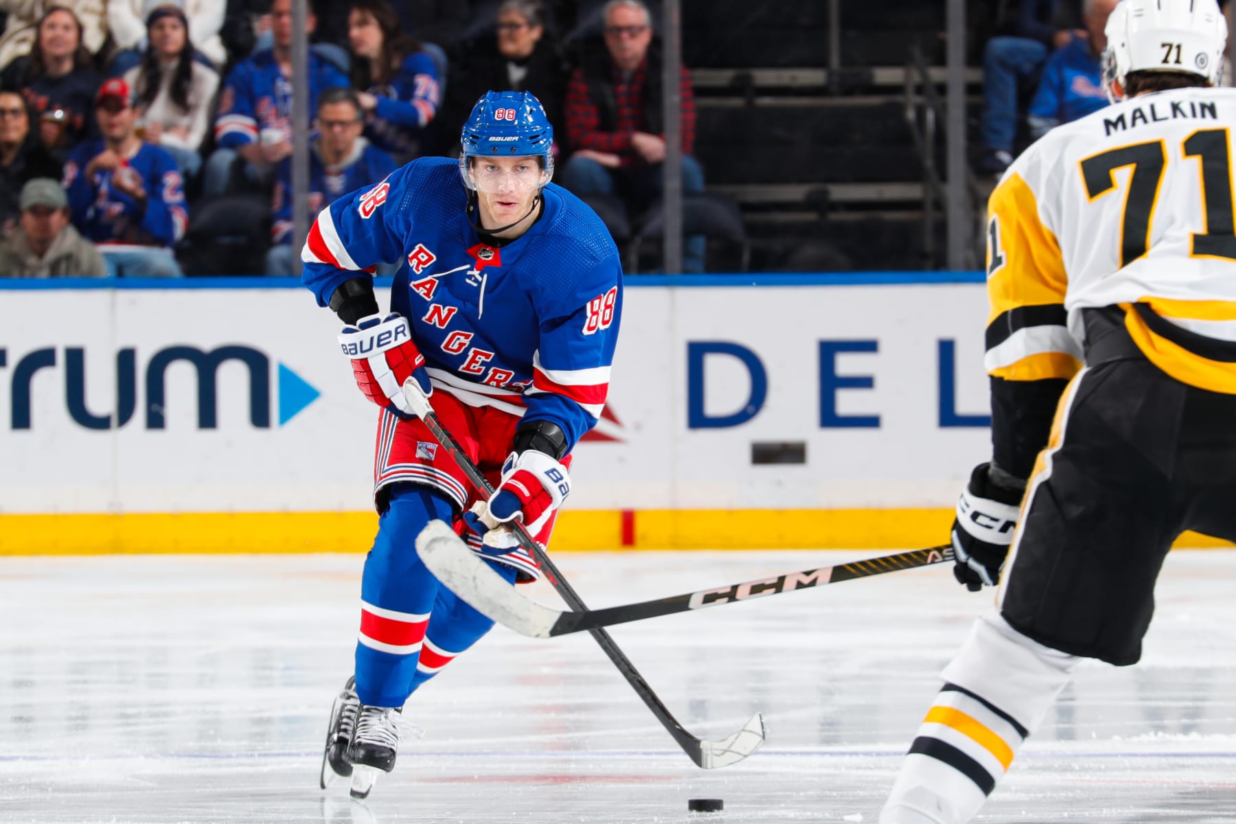 NEW YORK, NEW YORK - MARCH 18:  Patrick Kane #88 of the New York Rangers skates with the puck against the Pittsburgh Penguins at Madison Square Garden on March 18, 2023 in New York City. (Photo by Jared Silber/NHLI via Getty Images)