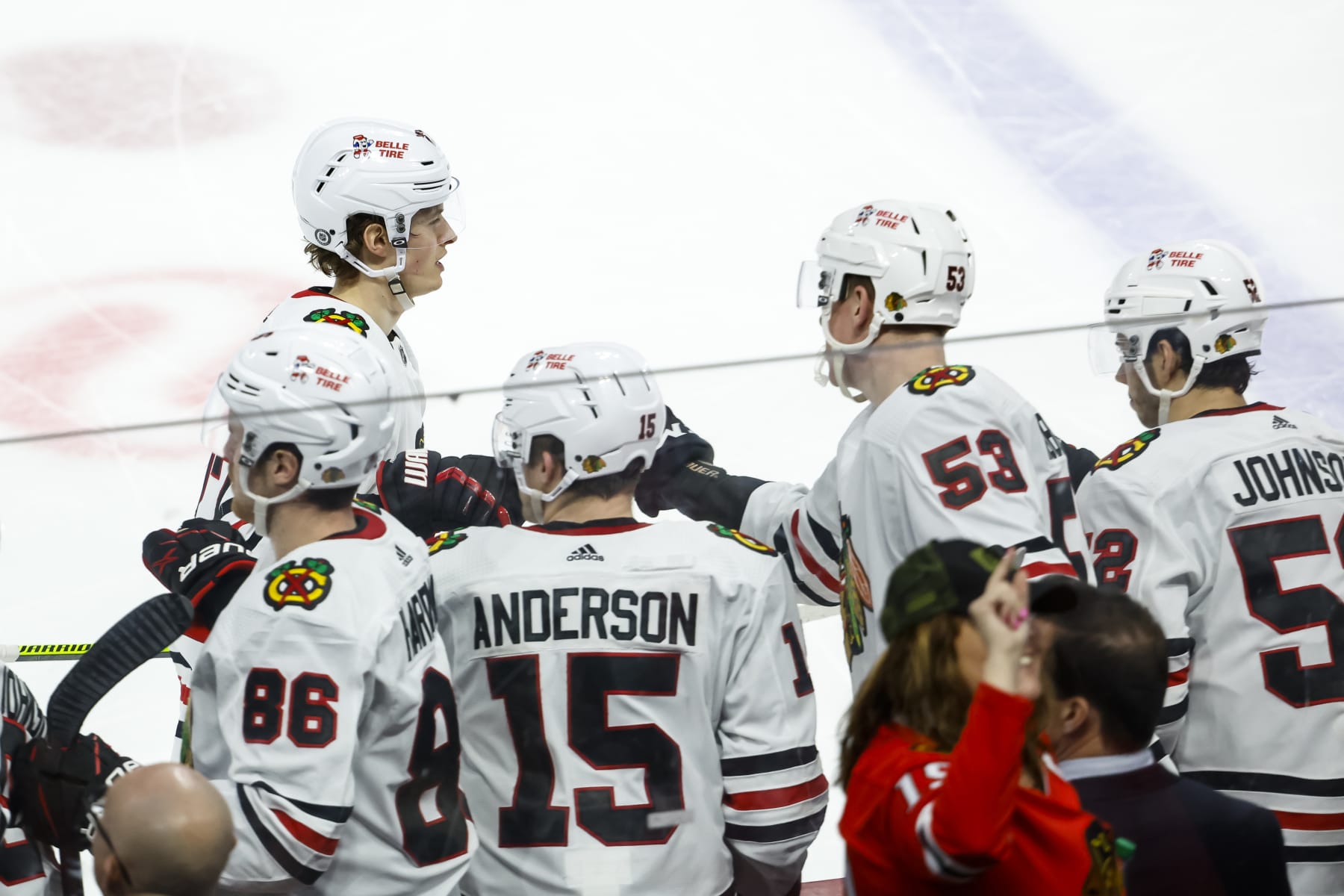 ST PAUL, MN - MARCH 25: Lukas Reichel #27 of the Chicago Blackhawks celebrates his goal against the Minnesota Wild with teammates on the bench in the third period of the game at Xcel Energy Center on March 25, 2023 in St Paul, Minnesota. The Wild defeated the Blackhawks 3-1. (Photo by David Berding/Getty Images)
