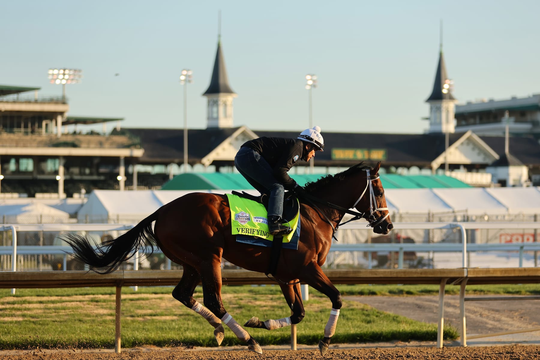 LOUISVILLE, KENTUCKY - MAY 04: Verifying trains on the track during morning workouts in preparation for the 149th running of the Kentucky Derby at Churchill Downs on May 04, 2023 in Louisville, Kentucky. (Photo by Michael Reaves/Getty Images)