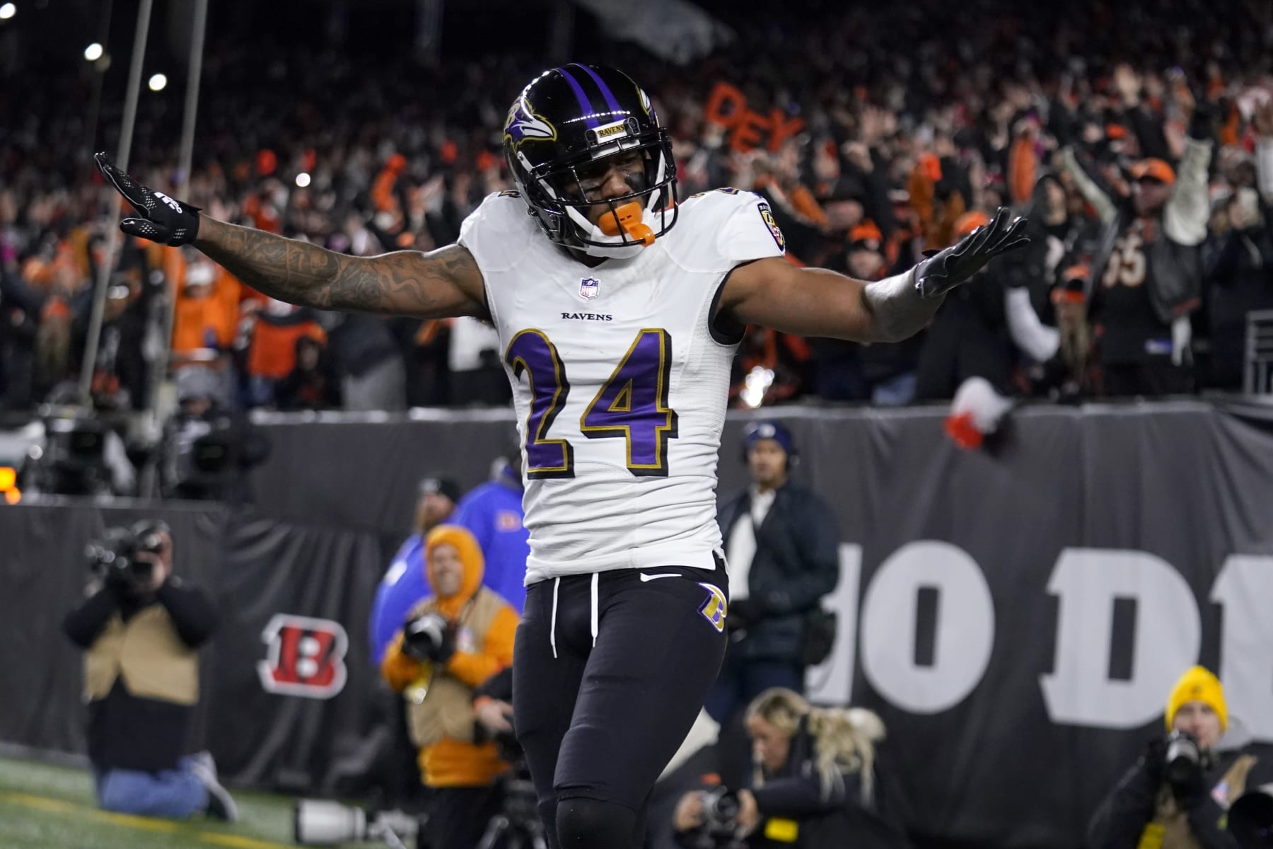 Baltimore Ravens cornerback Marcus Peters reacts to breaking up a pass intended for Cincinnati Bengals wide receiver Tee Higgins in the end zone in the first half of an NFL wild-card playoff football game in Cincinnati, Sunday, Jan. 15, 2023. (AP Photo/Jeff Dean)
