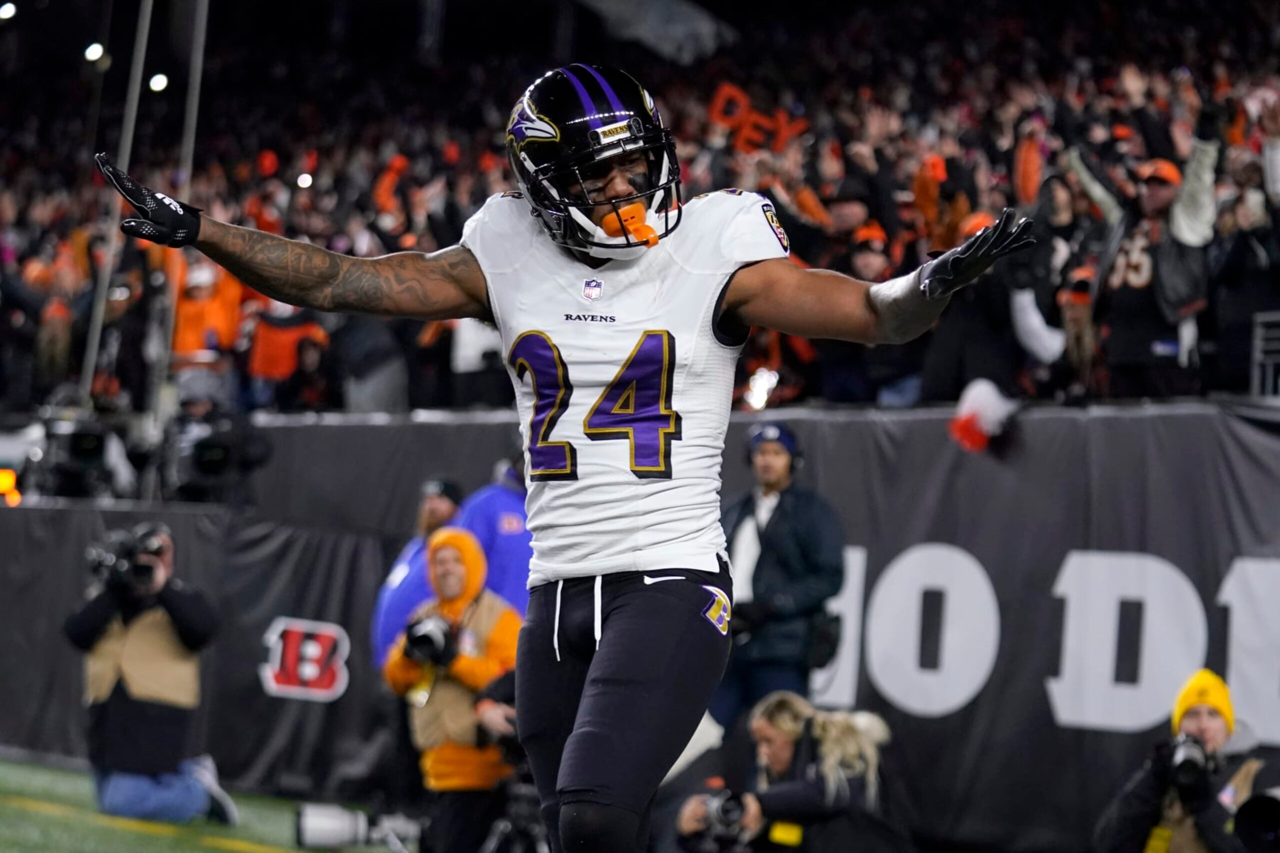 Baltimore Ravens cornerback Marcus Peters reacts to breaking up a pass intended for Cincinnati Bengals wide receiver Tee Higgins in the end zone in the first half of an NFL wild-card playoff football game in Cincinnati, Sunday, Jan. 15, 2023. (AP Photo/Jeff Dean)