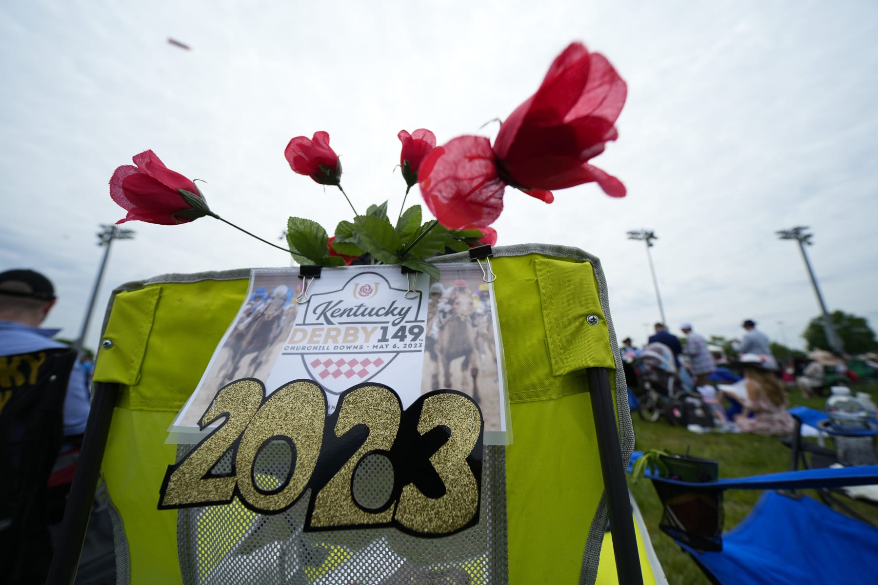 A picnic chair in the infield is decorated for the 149th running of the Kentucky Derby horse race at Churchill Downs Saturday, May 6, 2023, in Louisville, Ky. (AP Photo/Julio Cortez)