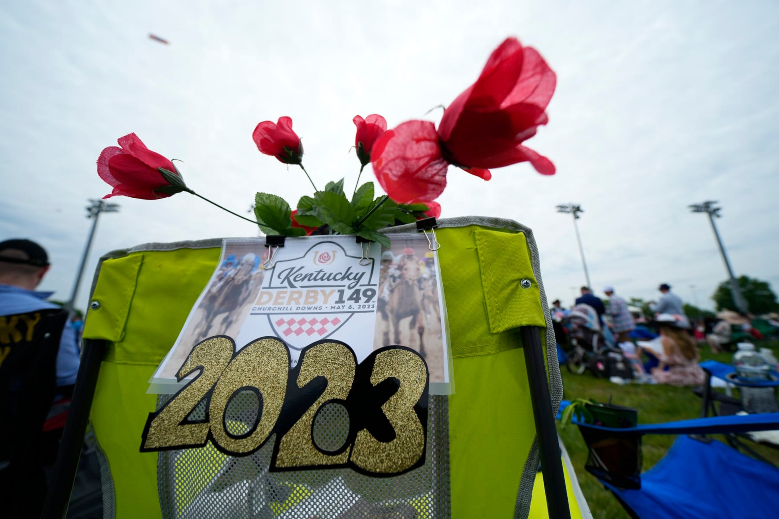 A picnic chair in the infield is decorated for the 149th running of the Kentucky Derby horse race at Churchill Downs Saturday, May 6, 2023, in Louisville, Ky. (AP Photo/Julio Cortez)