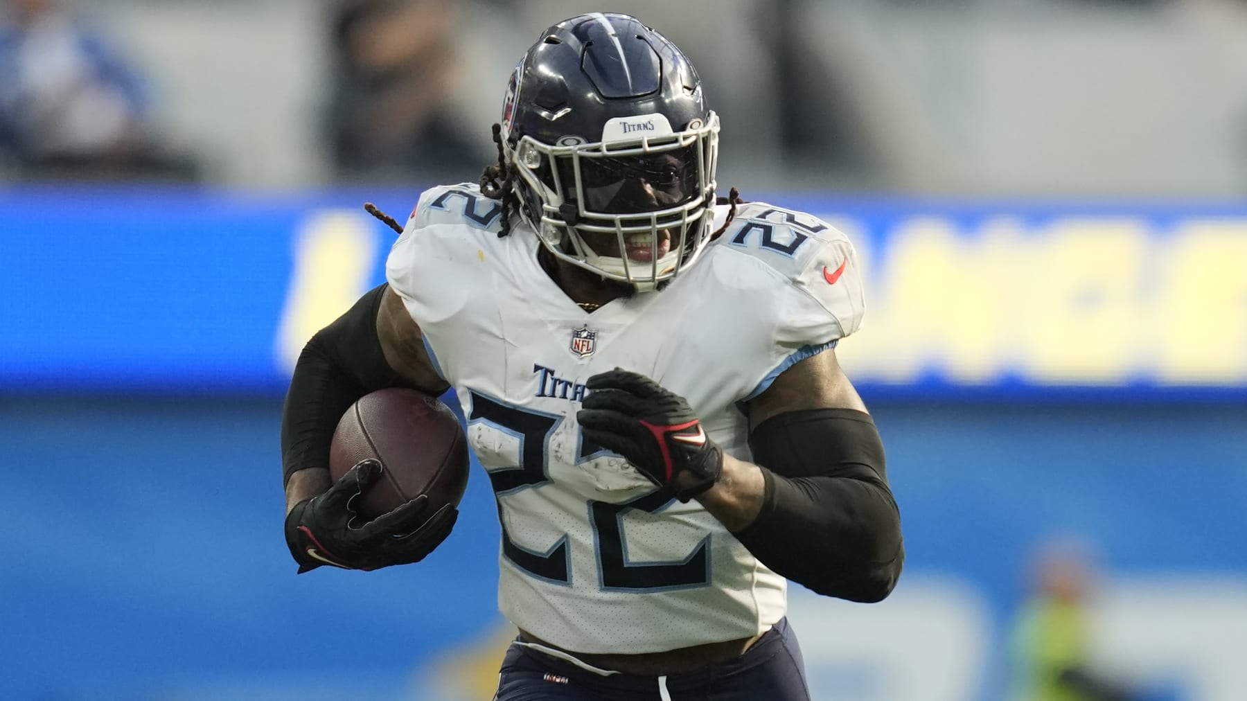Tennessee Titans running back Derrick Henry (22) runs the ball during an NFL football game against the Los Angeles Chargers Monday, Dec. 19, 2022, in Inglewood, Calif. (AP Photo/Ashley Landis)