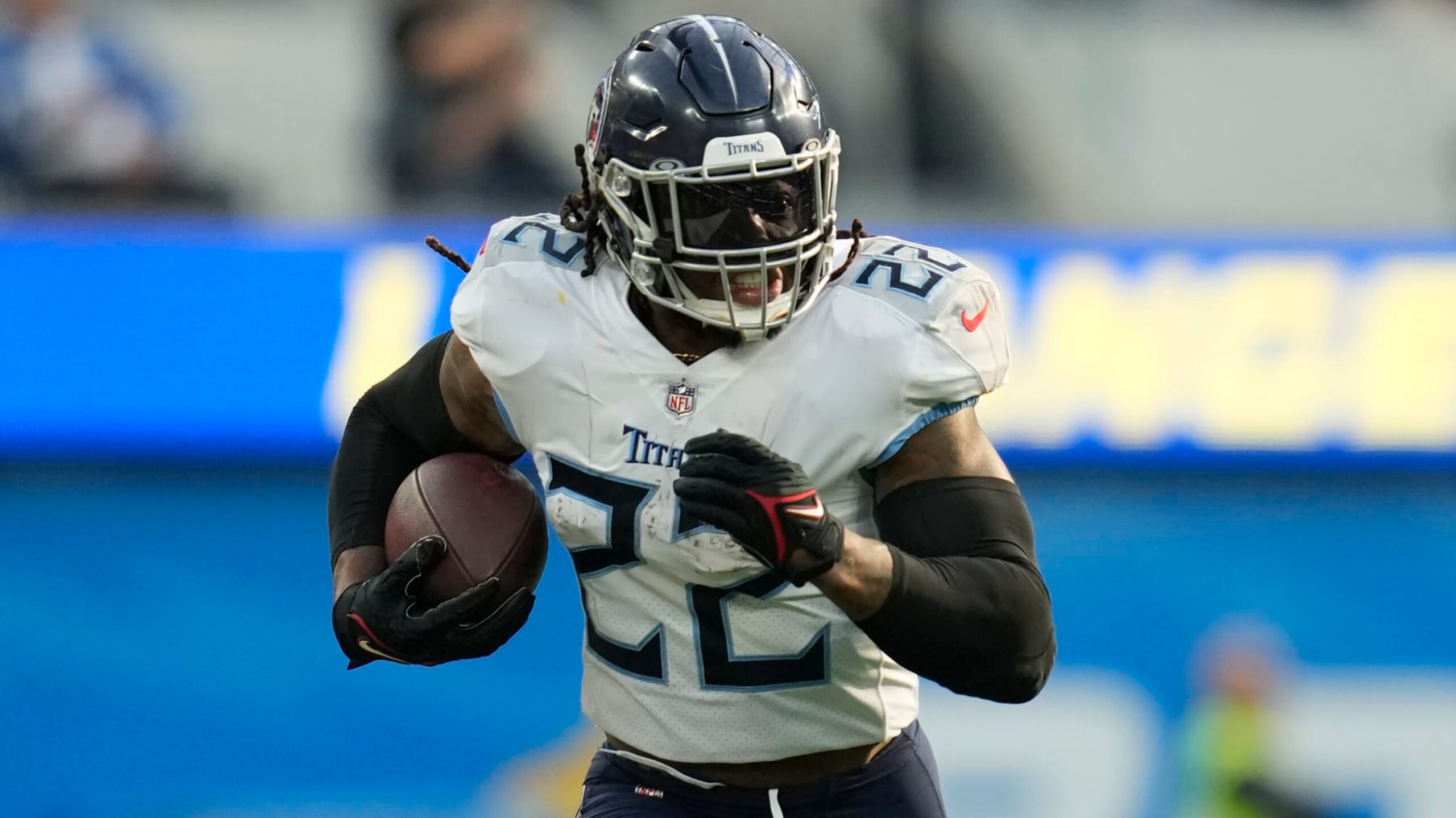 Tennessee Titans running back Derrick Henry (22) runs the ball during an NFL football game against the Los Angeles Chargers Monday, Dec. 19, 2022, in Inglewood, Calif. (AP Photo/Ashley Landis)