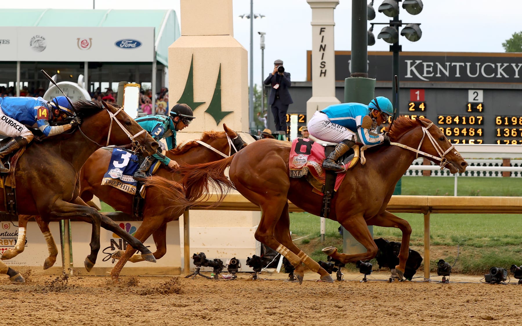 LOUISVILLE, KENTUCKY - MAY 06: Mage #8, ridden by jockey Javier Castellano crosses the finish line to win the 149th running of the Kentucky Derby at Churchill Downs on May 06, 2023 in Louisville, Kentucky. (Photo by Sam Mallon/Getty Images)