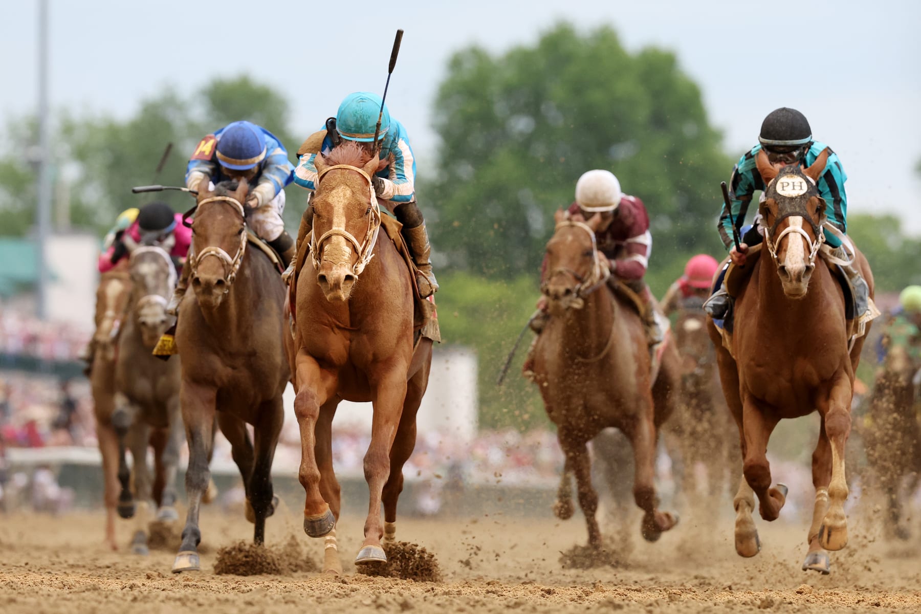 LOUISVILLE, KENTUCKY - MAY 06: Mage #8, ridden by jockey Javier Castellano crosses the finish line to win the 149th running of the Kentucky Derby at Churchill Downs on May 06, 2023 in Louisville, Kentucky. (Photo by Michael Reaves/Getty Images)