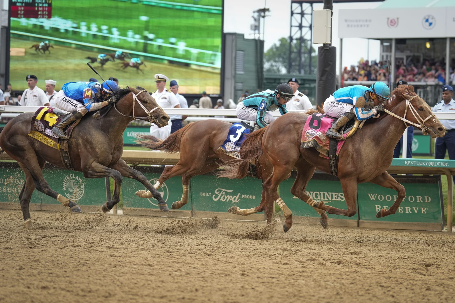 Mage, with Javier Castellano up, (8) wins the 149th running of the Kentucky Derby followed by Two Phil's, with Jareth Loveberry up, (3) and Angel of Empire, with Flavien Prat up, (14) at Churchill Downs Saturday, May 6, 2023, in Louisville, Ky. (AP Photo/Bryan Woolston)