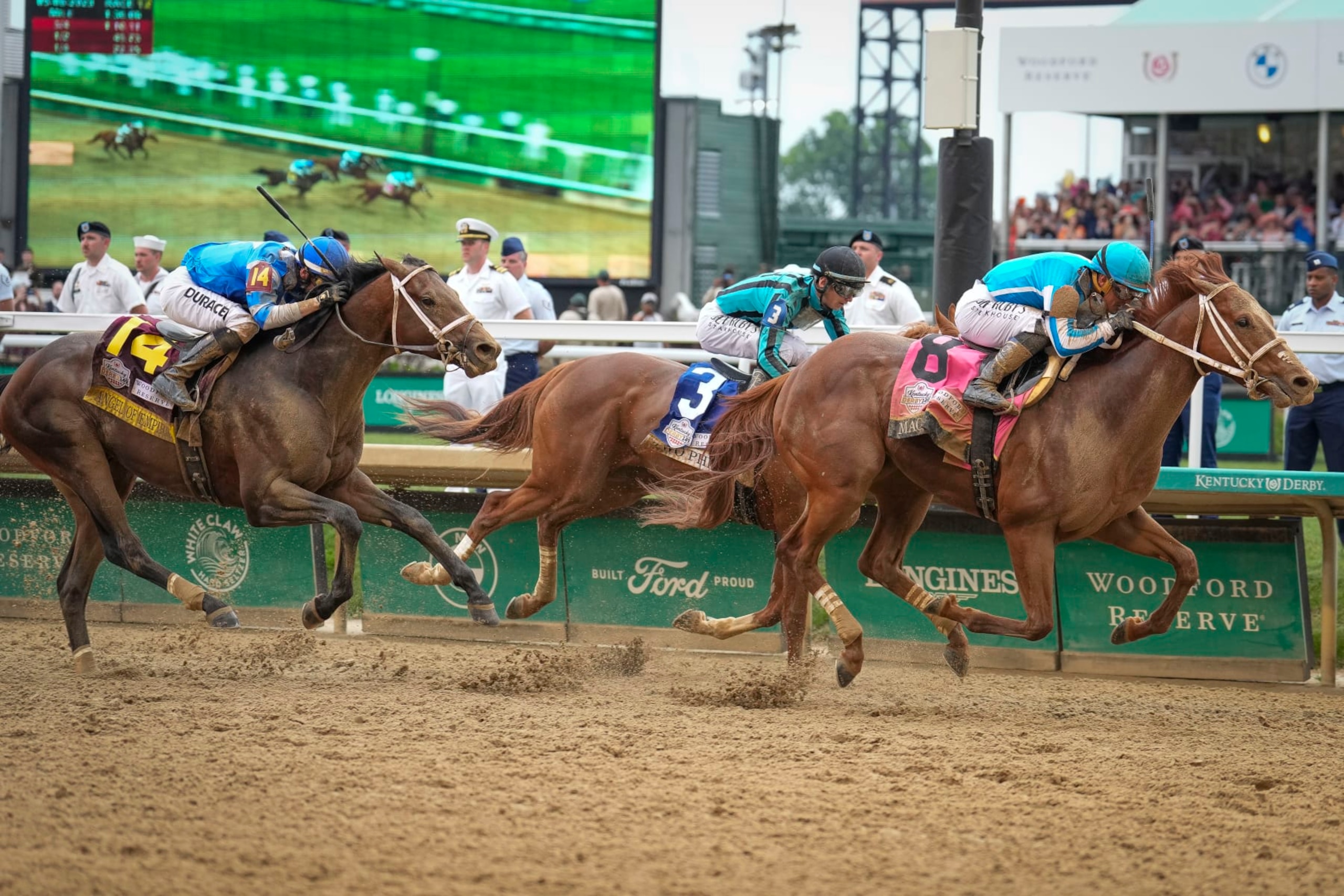 Mage, with Javier Castellano up, (8) wins the 149th running of the Kentucky Derby followed by Two Phil's, with Jareth Loveberry up, (3) and Angel of Empire, with Flavien Prat up, (14) at Churchill Downs Saturday, May 6, 2023, in Louisville, Ky. (AP Photo/Bryan Woolston)