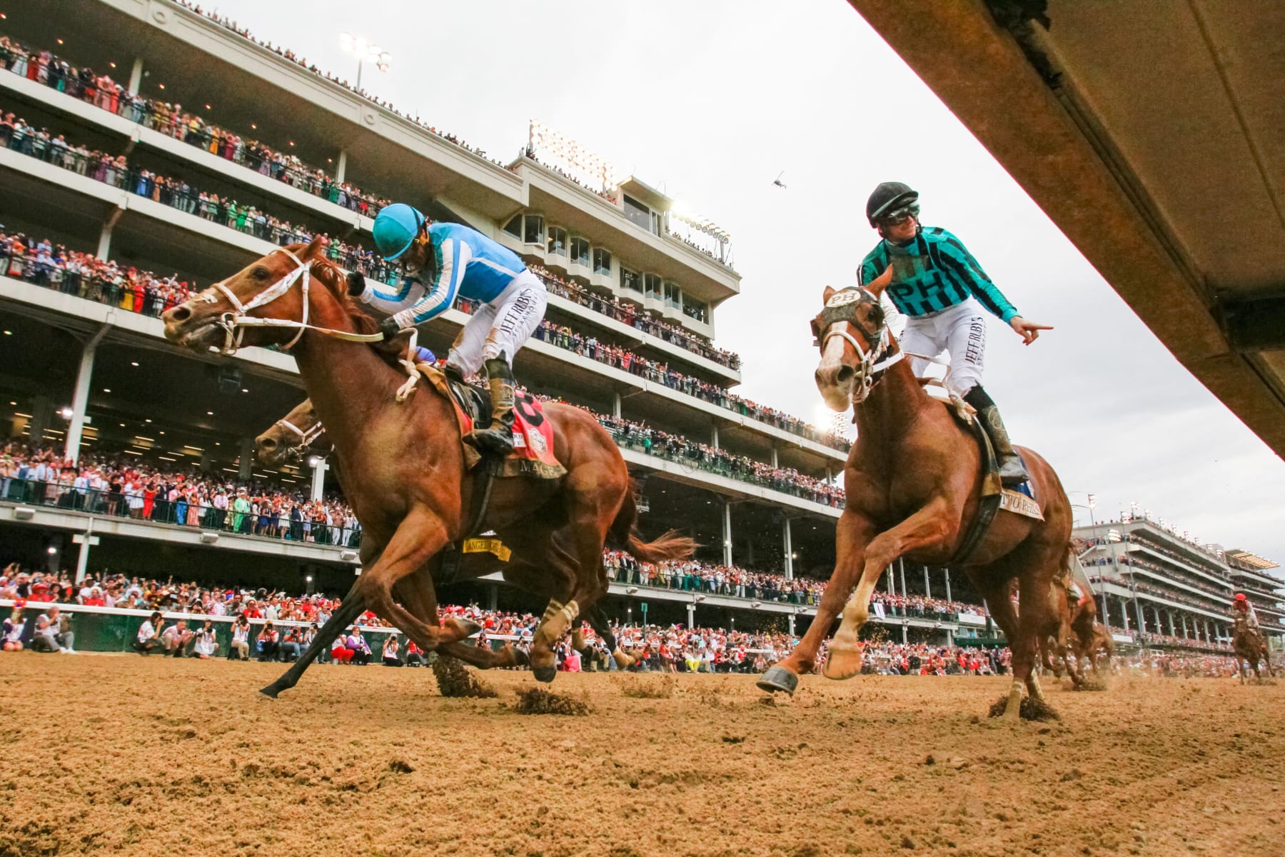US-Venezuelan Jockey Javier Castellano on Mage (L) celebrates winning the 149th Kentucky Derby at Churchill Downs Racetrack in Louisville, Kentucky, on May 6, 2023. - Mage won the 149th Kentucky Derby, launching US racing's Triple Crown campaign even as two more horse deaths on Saturday cast a pall on proceedings at Churchill Downs in Louisville, Kentucky. (Photo by LEANDRO LOZADA / AFP) (Photo by LEANDRO LOZADA/AFP via Getty Images)