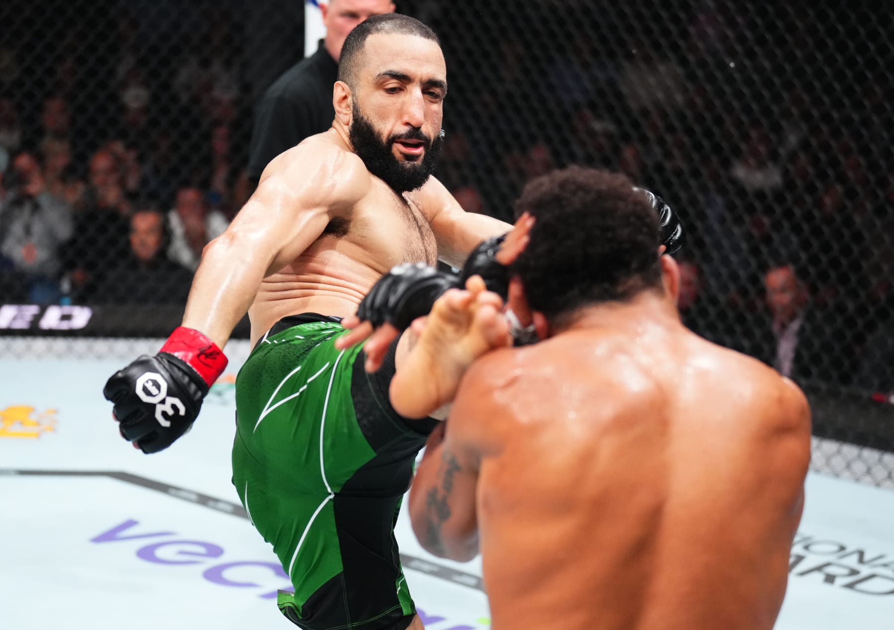 NEWARK, NEW JERSEY - MAY 06: (L-R) Belal Muhammad kicks Gilbert Burns of Brazil in a welterweight fight during the UFC 288 event at Prudential Center on May 06, 2023 in Newark, New Jersey. (Photo by Chris Unger/Zuffa LLC via Getty Images)