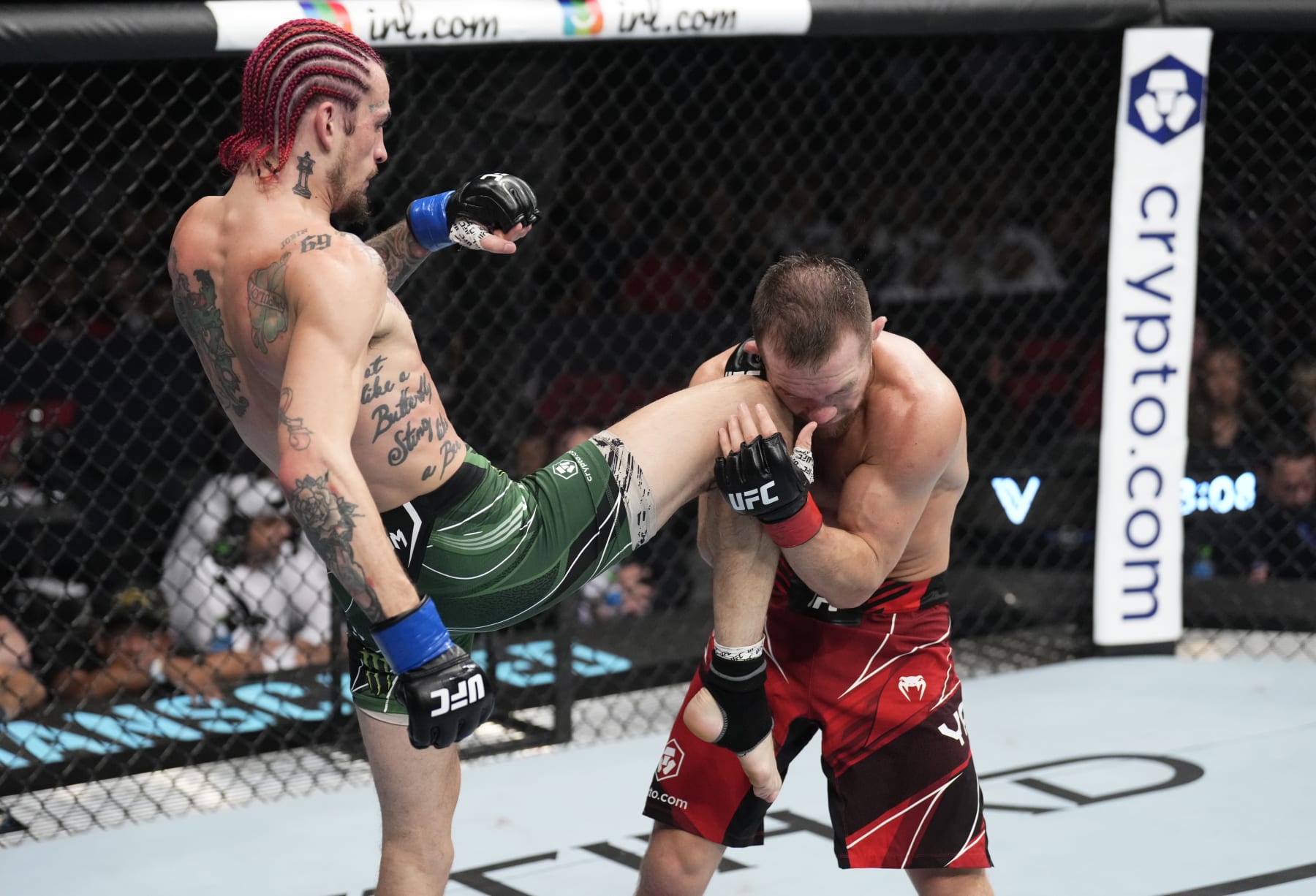 ABU DHABI, UNITED ARAB EMIRATES - OCTOBER 22: (L-R) Sean O'Malley knees Petr Yan of Russia  in a bantamweight fight during the UFC 280 event at Etihad Arena on October 22, 2022 in Abu Dhabi, United Arab Emirates. (Photo by Chris Unger/Zuffa LLC)