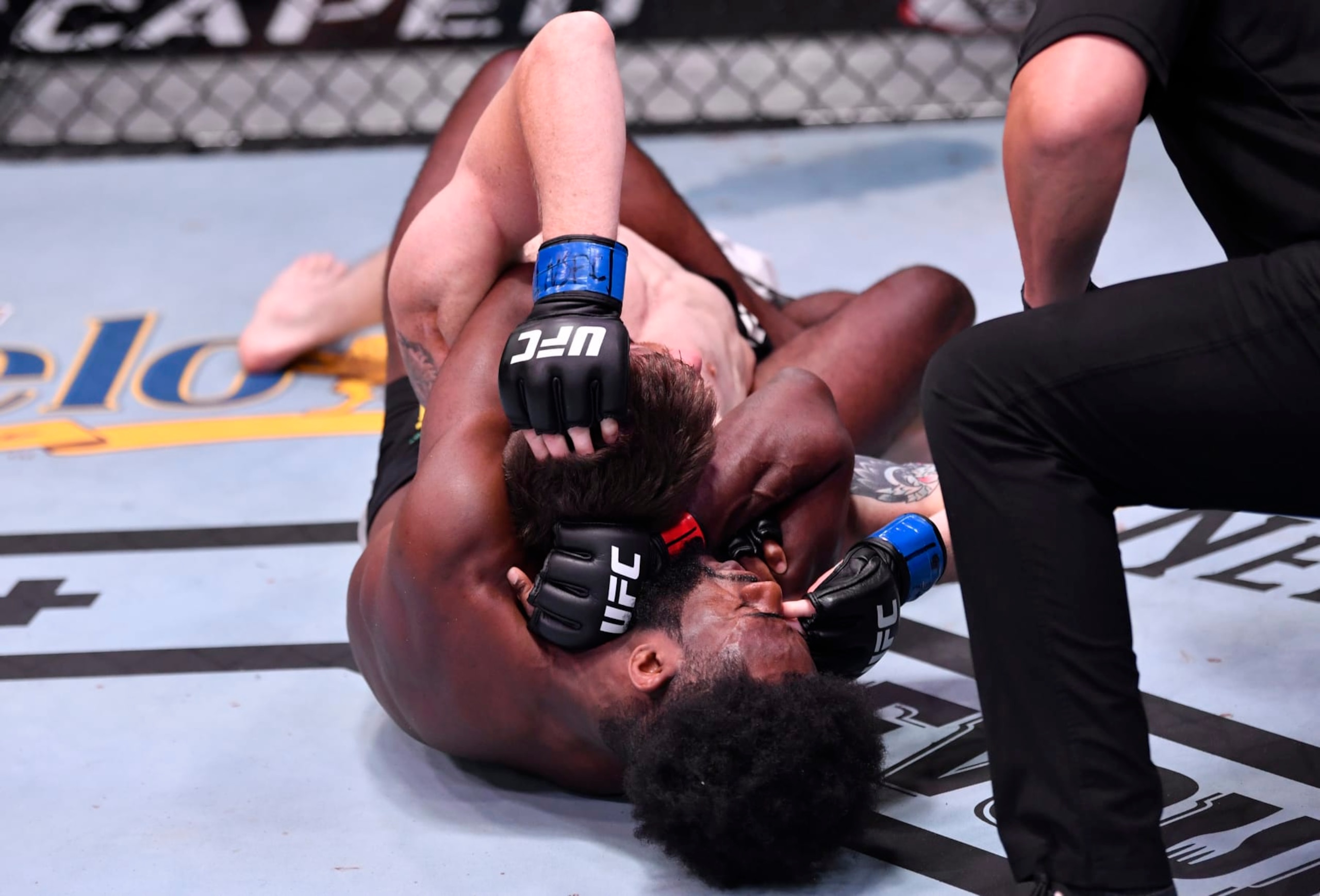 LAS VEGAS, NEVADA - JUNE 06: Aljamain Sterling secures a rear choke submission against Cory Sandhagen in their bantamweight bout during the UFC 250 event at UFC APEX on June 06, 2020 in Las Vegas, Nevada. (Photo by Jeff Bottari/Zuffa LLC)