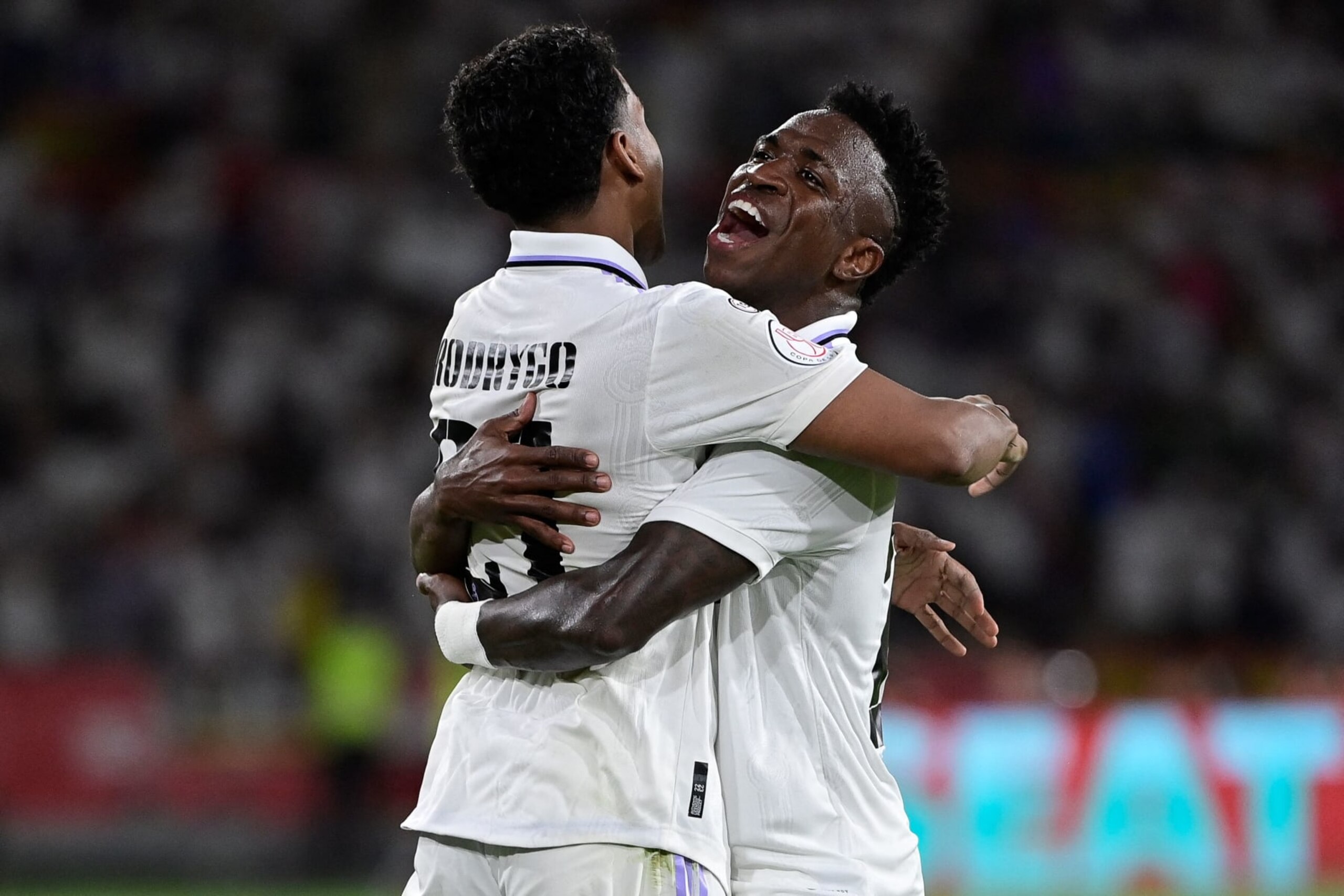 Real Madrid's Brazilian forward Rodrygo (L) celebrates with Real Madrid's Brazilian forward Vinicius Junior after scoring his team's second goal during the Spanish Copa del Rey (King's Cup) final football match between Real Madrid CF and CA Osasuna at La Cartuja stadium in Seville on May 6, 2023. (Photo by ANDER GILLENEA / AFP) (Photo by ANDER GILLENEA/AFP via Getty Images) Real Madrid's Brazilian forward Rodrygo (L) celebrates with Real Madrid's Brazilian forward Vinicius Junior after scoring his team's second goal during the Spanish Copa del Rey (King's Cup) final football match between Real Madrid CF and CA Osasuna at La Cartuja stadium in Seville on May 6, 2023. (Photo by ANDER GILLENEA / AFP) (Photo by ANDER GILLENEA/AFP via Getty Images)