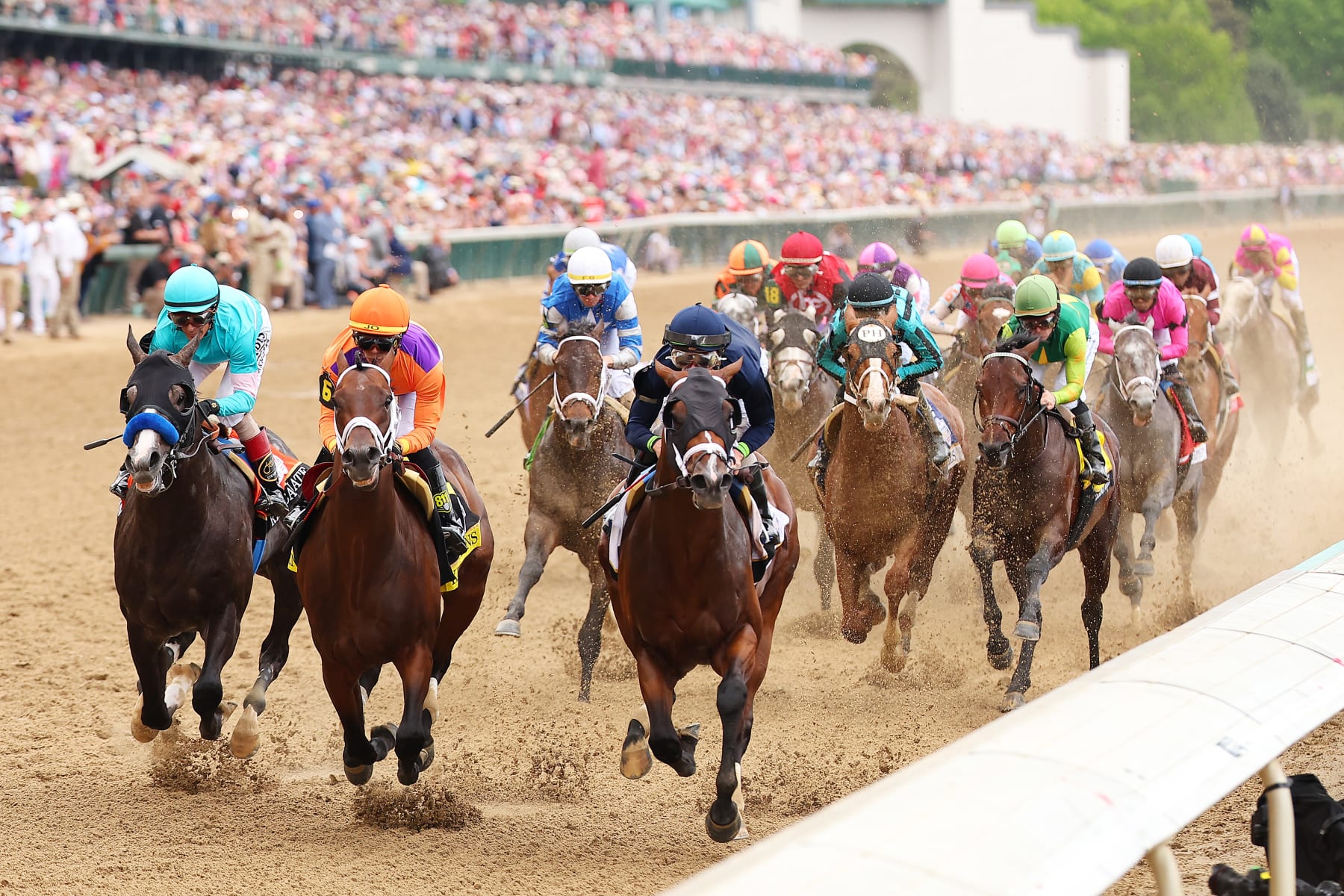 LOUISVILLE, KENTUCKY - MAY 06: The field heads to the first turn during the 149th running of the Kentucky Derby at Churchill Downs on May 06, 2023 in Louisville, Kentucky. (Photo by Michael Reaves/Getty Images)