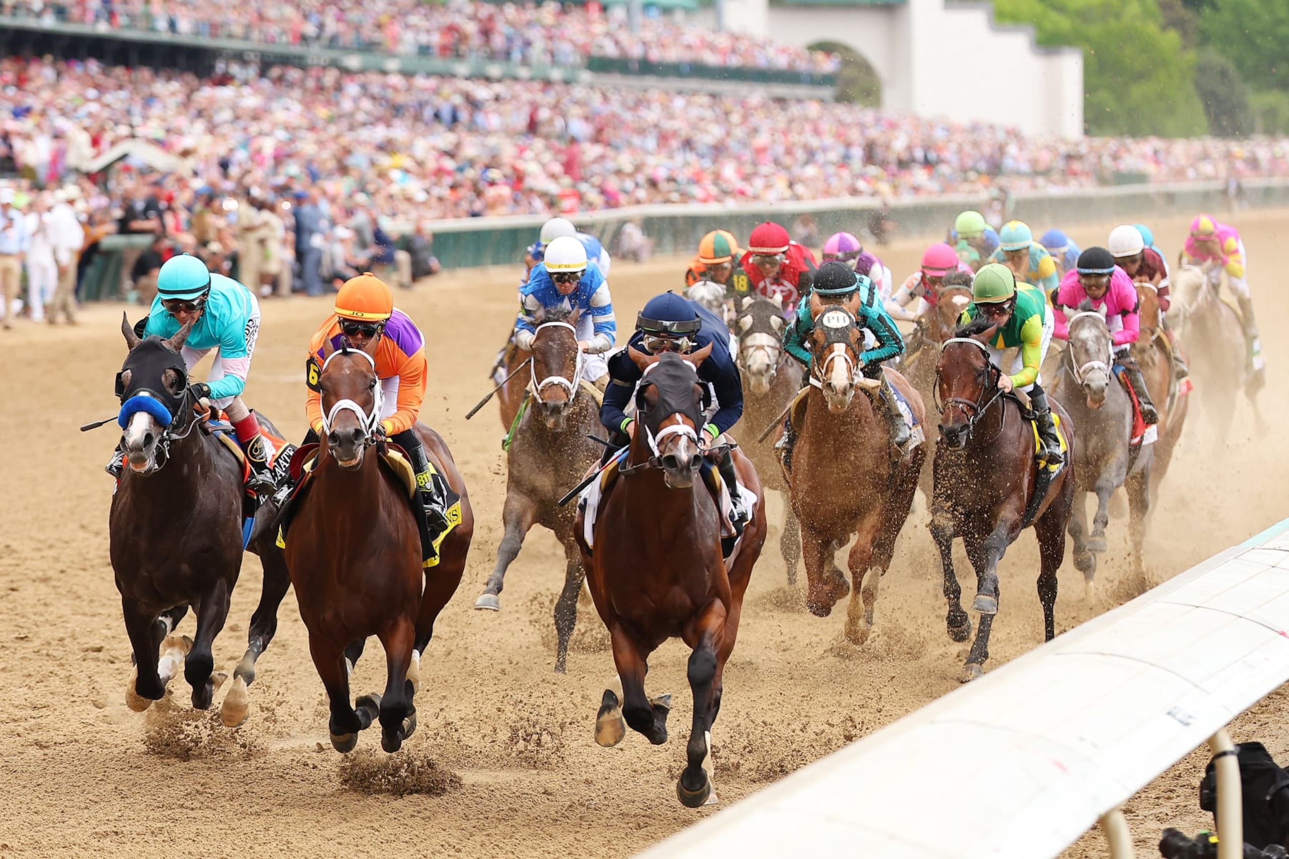 LOUISVILLE, KENTUCKY - MAY 06: The field heads to the first turn during the 149th running of the Kentucky Derby at Churchill Downs on May 06, 2023 in Louisville, Kentucky. (Photo by Michael Reaves/Getty Images)
