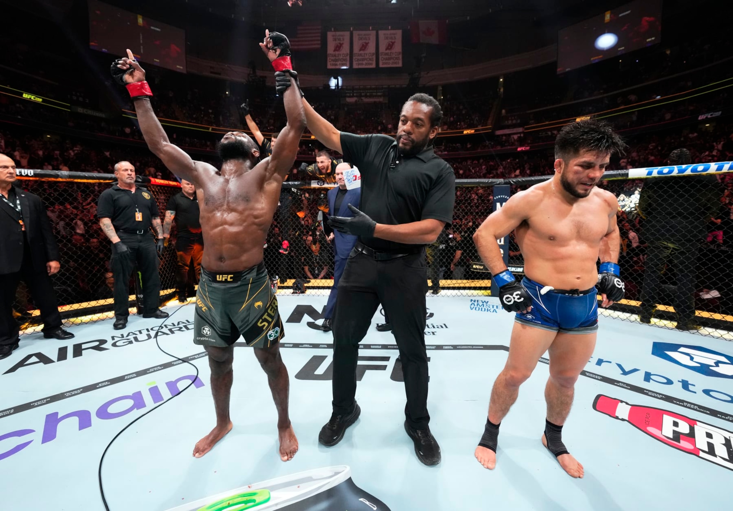 NEWARK, NEW JERSEY - MAY 06: Aljamain Sterling react after his victory over Henry Cejudo in the UFC bantamweight championship fight during the UFC 288 event at Prudential Center on May 06, 2023 in Newark, New Jersey. (Photo by Chris Unger/Zuffa LLC via Getty Images)