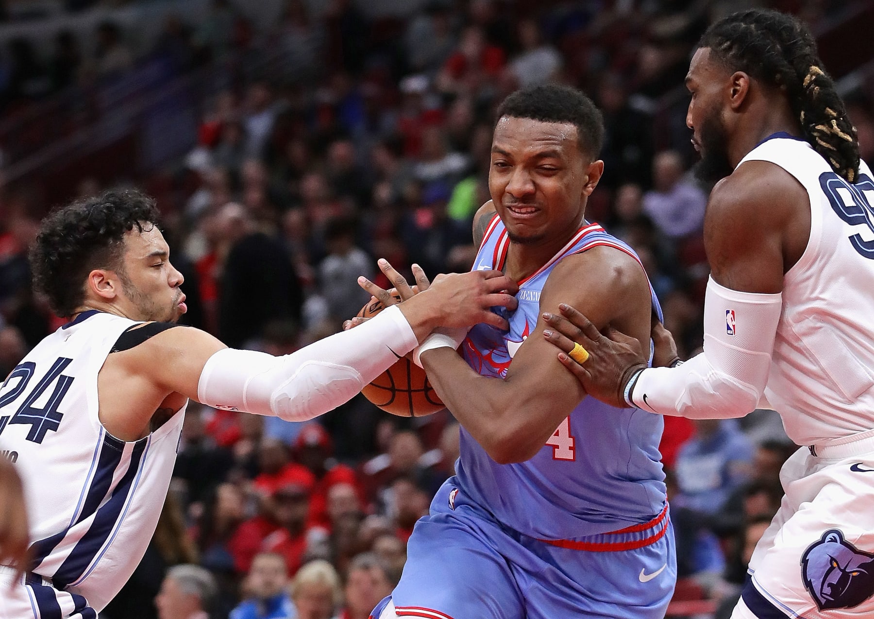 CHICAGO, ILLINOIS - DECEMBER 04: Wendell Carter Jr. #34 of the Chicago Bulls tries to drive between Dillon Brooks #24 (L) and Jae Crowder #99 of the Memphis Grizzlies at the United Center on December 04, 2019 in Chicago, Illinois. NOTE TO USER: User expressly acknowledges and agrees that , by downloading and or using this photograph, User is consenting to the terms and conditions of the Getty Images License Agreement. (Photo by Jonathan Daniel/Getty Images)