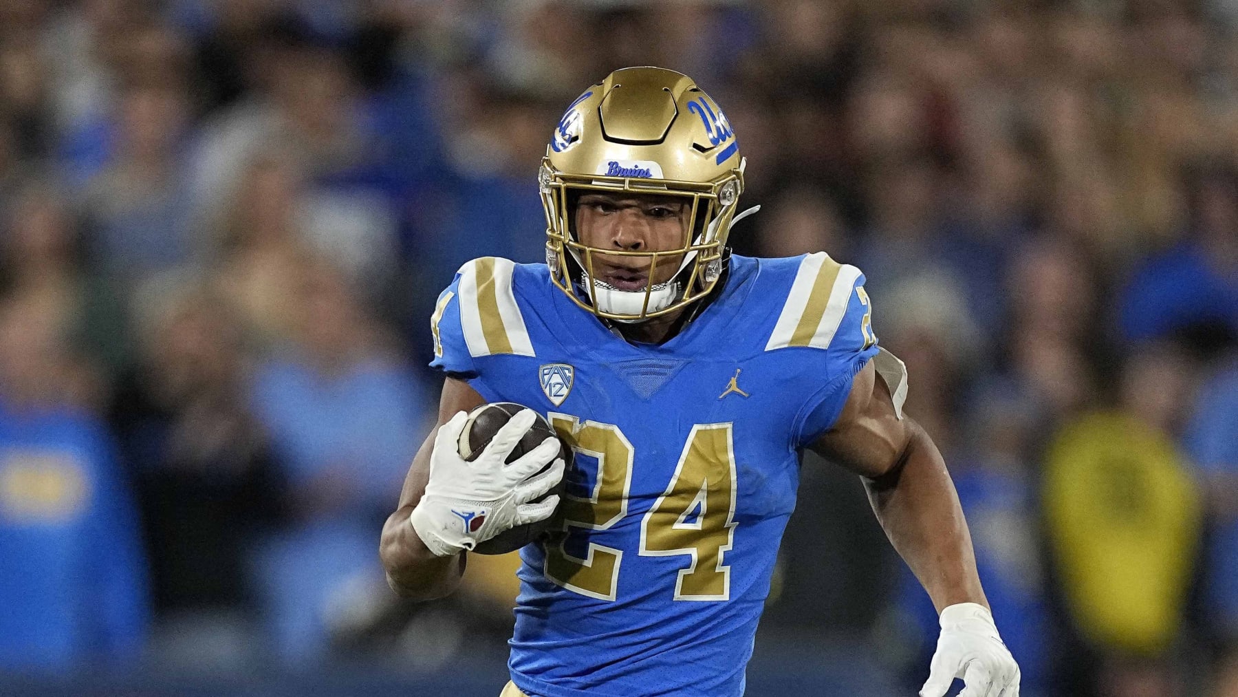 UCLA running back Zach Charbonnet runs the ball during the first half of an NCAA college football game against Southern California Saturday, Nov. 19, 2022, in Pasadena, Calif. (AP Photo/Mark J. Terrill)