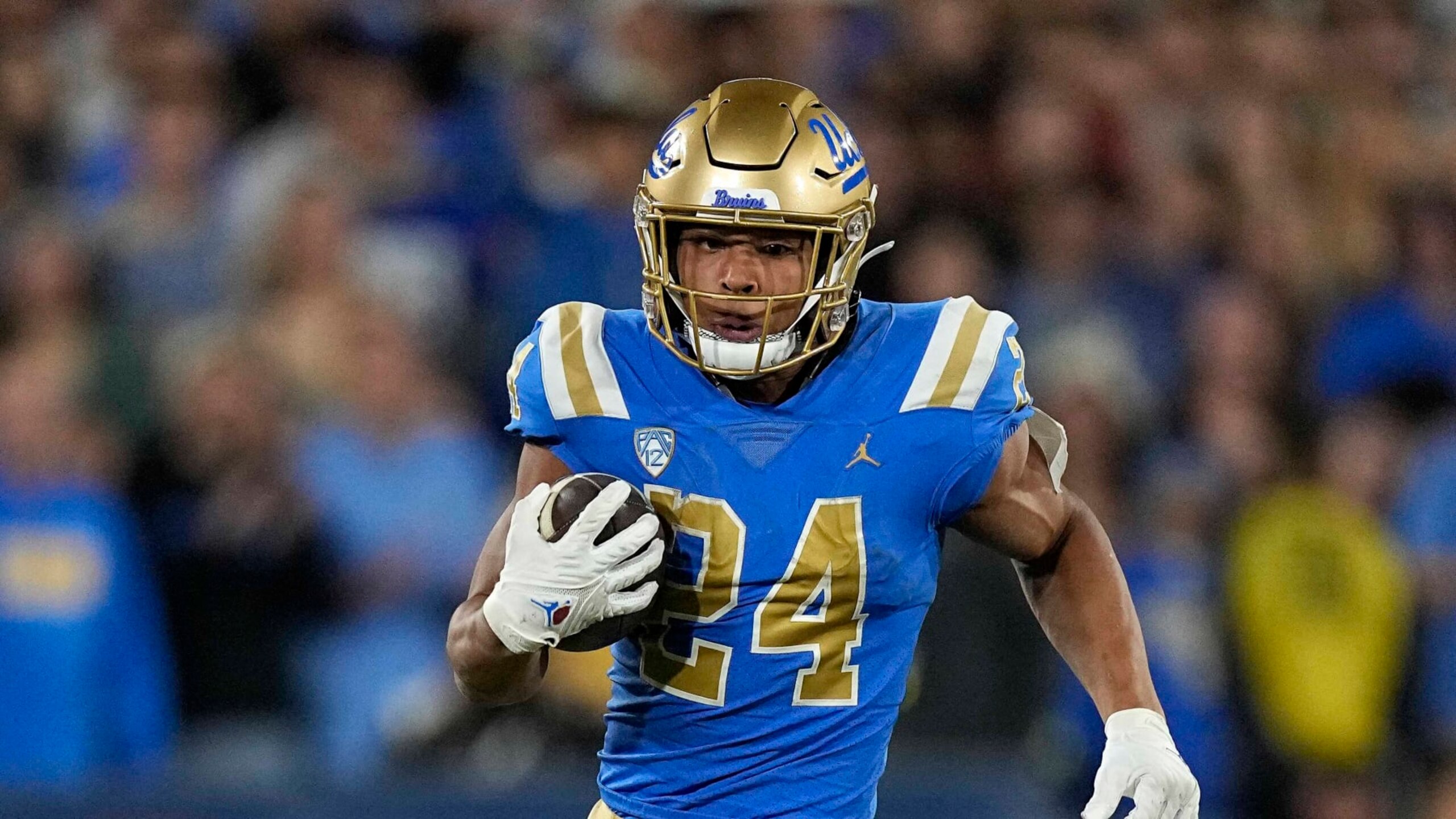 UCLA running back Zach Charbonnet runs the ball during the first half of an NCAA college football game against Southern California Saturday, Nov. 19, 2022, in Pasadena, Calif. (AP Photo/Mark J. Terrill) UCLA running back Zach Charbonnet runs the ball during the first half of an NCAA college football game against Southern California Saturday, Nov. 19, 2022, in Pasadena, Calif. (AP Photo/Mark J. Terrill)