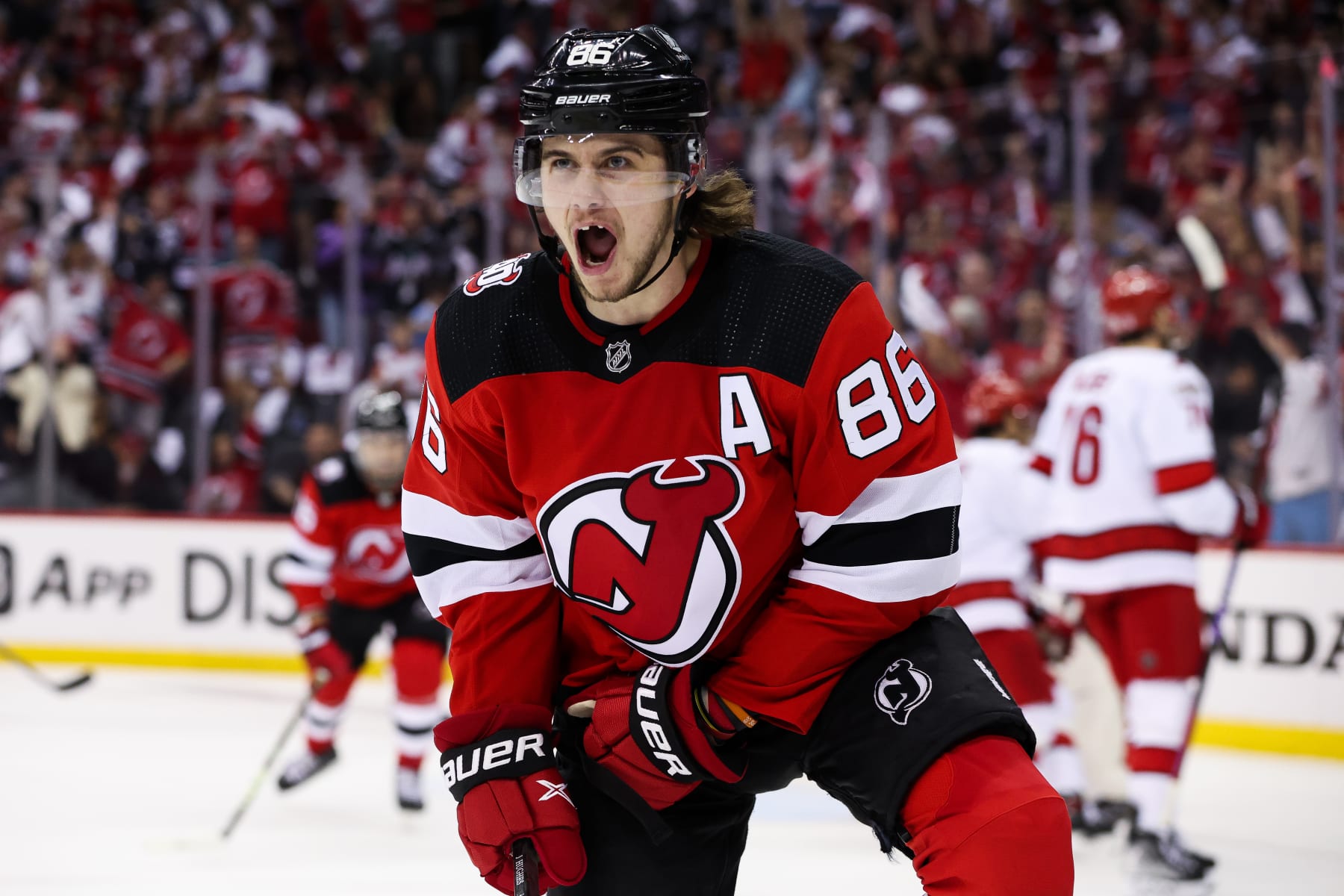 NEWARK, NJ - MAY 07: New Jersey Devils center Jack Hughes (86) celebrates after scoring a goal during Game 3 of an Eastern Conference Second Round playoff game between the Carolina Hurricanes and the New Jersey Devils on May 7, 2023, at Prudential Center in Newark, New Jersey. (Photo by Andrew Mordzynski/Icon Sportswire via Getty Images)