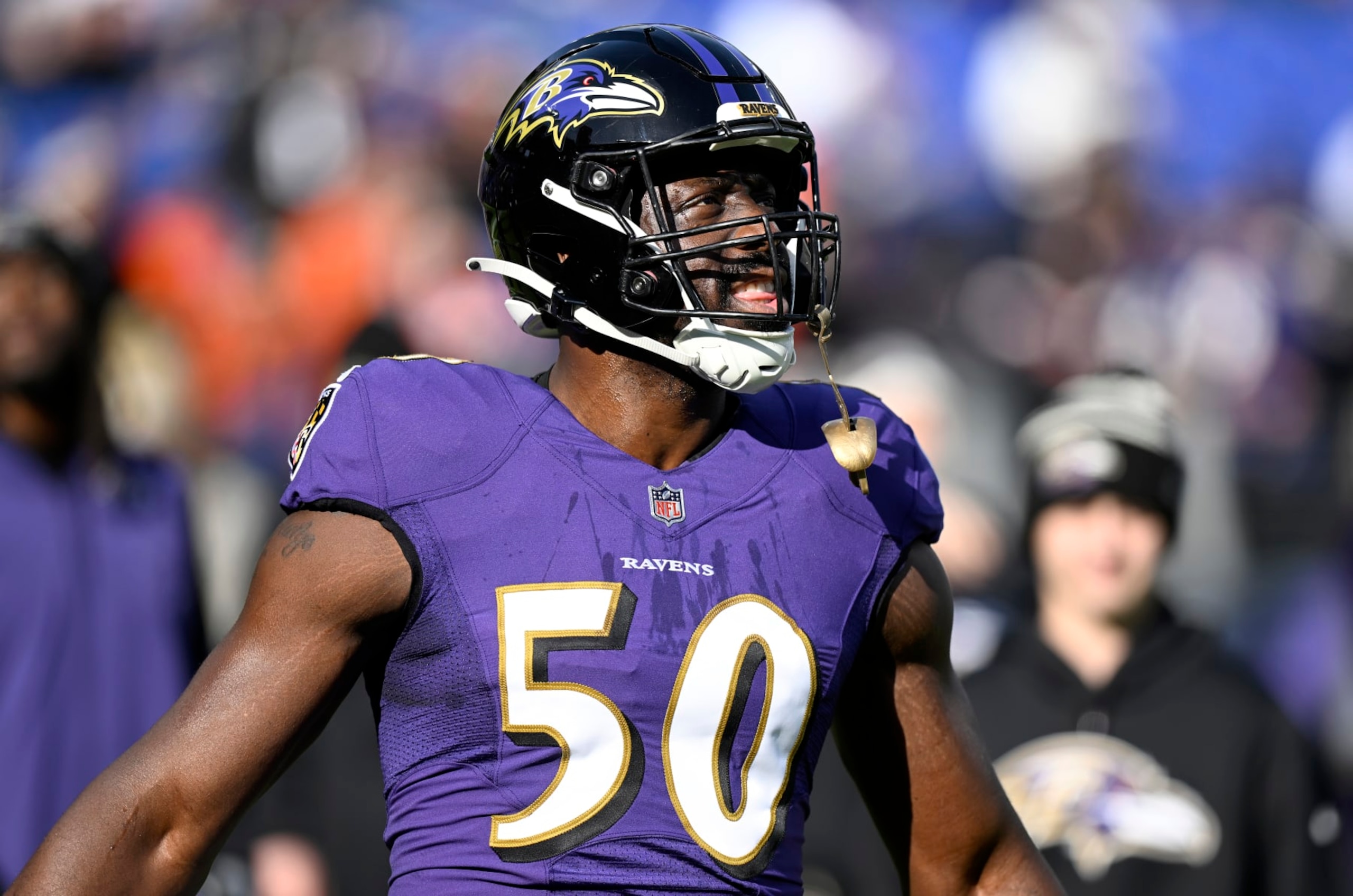 BALTIMORE, MARYLAND - DECEMBER 04: Justin Houston #50 of the Baltimore Ravens warms up before the game against the Denver Broncos at M&T Bank Stadium on December 04, 2022 in Baltimore, Maryland. (Photo by G Fiume/Getty Images) BALTIMORE, MARYLAND - DECEMBER 04: Justin Houston #50 of the Baltimore Ravens warms up before the game against the Denver Broncos at M&T Bank Stadium on December 04, 2022 in Baltimore, Maryland. (Photo by G Fiume/Getty Images)