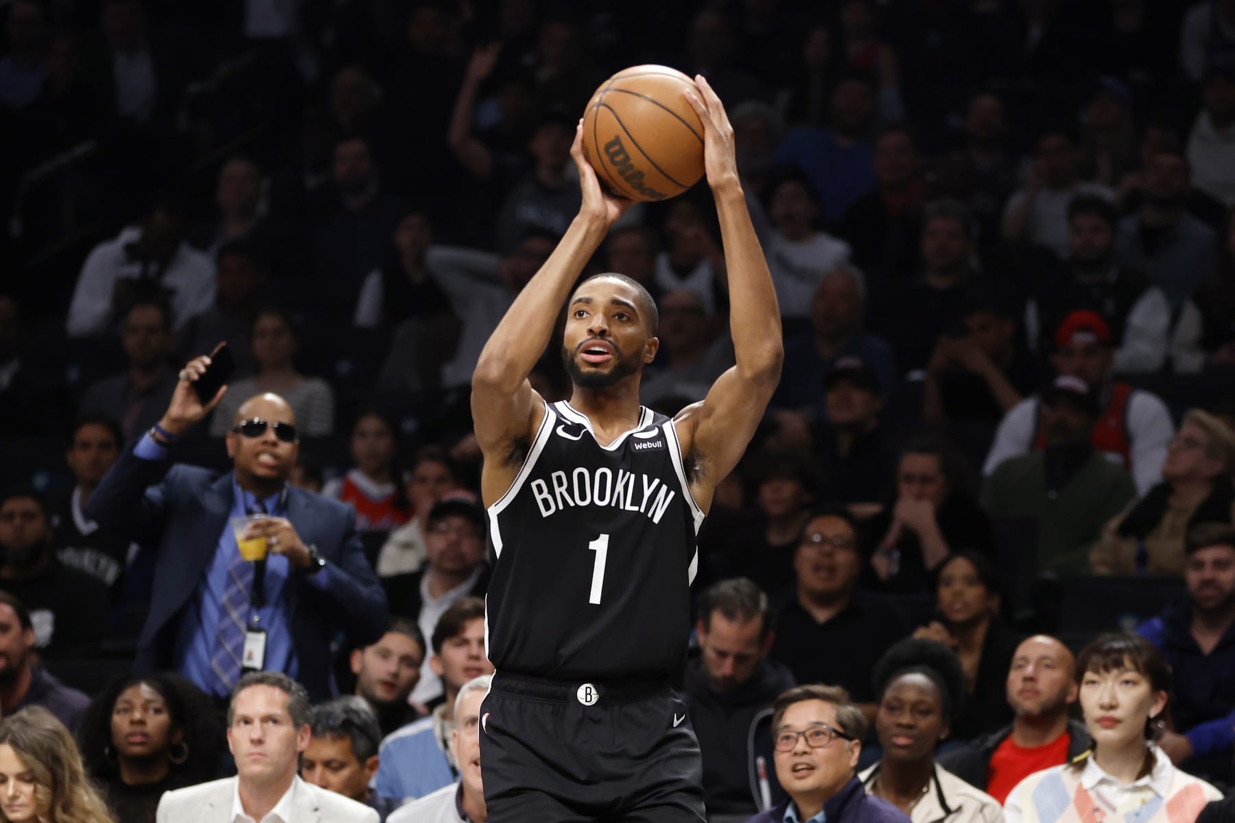 NEW YORK, NEW YORK - APRIL 20: Mikal Bridges #1 of the Brooklyn Nets shoots the ball against the Philadelphia 76ers during the first half of Game Three of the Eastern Conference First Round Playoffs at Barclays Center on April 20, 2023 in the Brooklyn borough of New York City. NOTE TO USER: User expressly acknowledges and agrees that, by downloading and or using this photograph, User is consenting to the terms and conditions of the Getty Images License Agreement. (Photo by Sarah Stier/Getty Images)