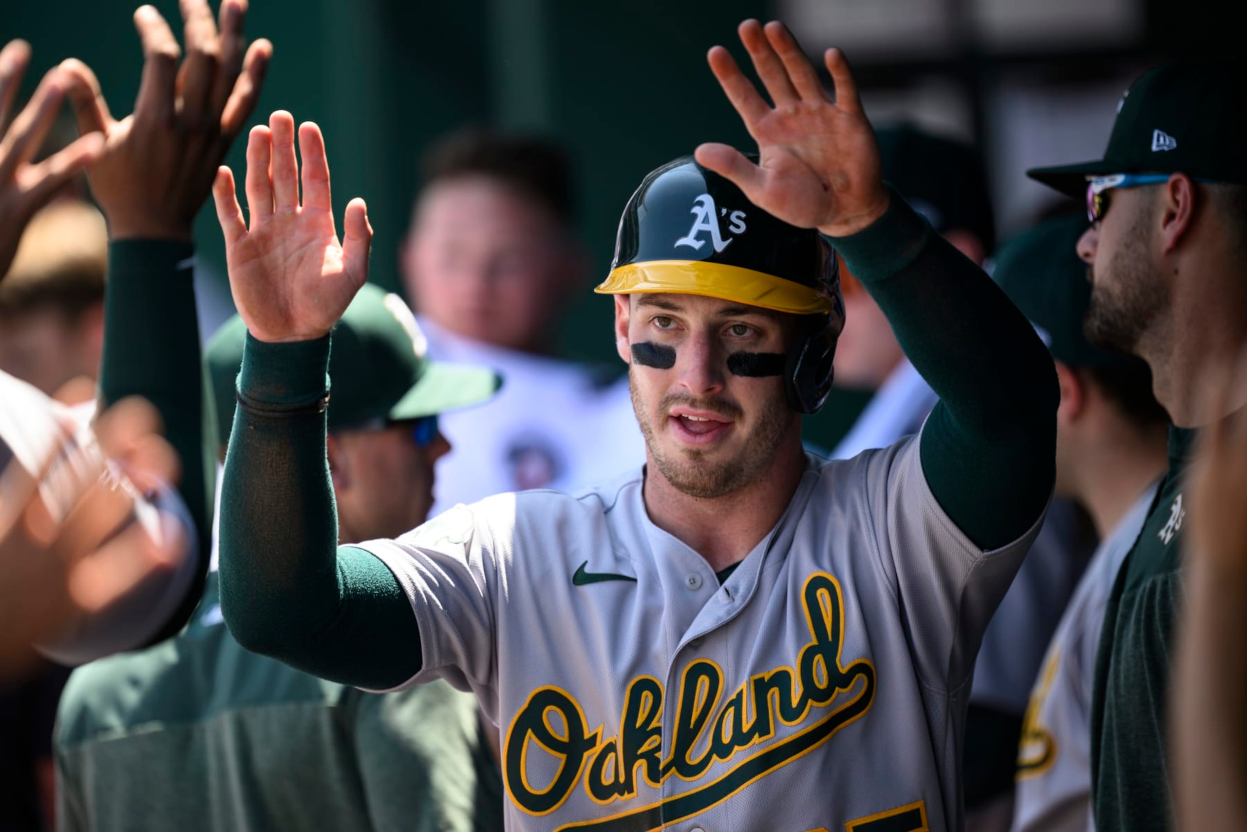 Oakland Athletics' Brent Rooker is congratulated after scoring against the Kansas City Royals during the fourth inning of a baseball game, Sunday, May 7, 2023, in Kansas City, Mo. (AP Photo/Reed Hoffmann) Oakland Athletics' Brent Rooker is congratulated after scoring against the Kansas City Royals during the fourth inning of a baseball game, Sunday, May 7, 2023, in Kansas City, Mo. (AP Photo/Reed Hoffmann)