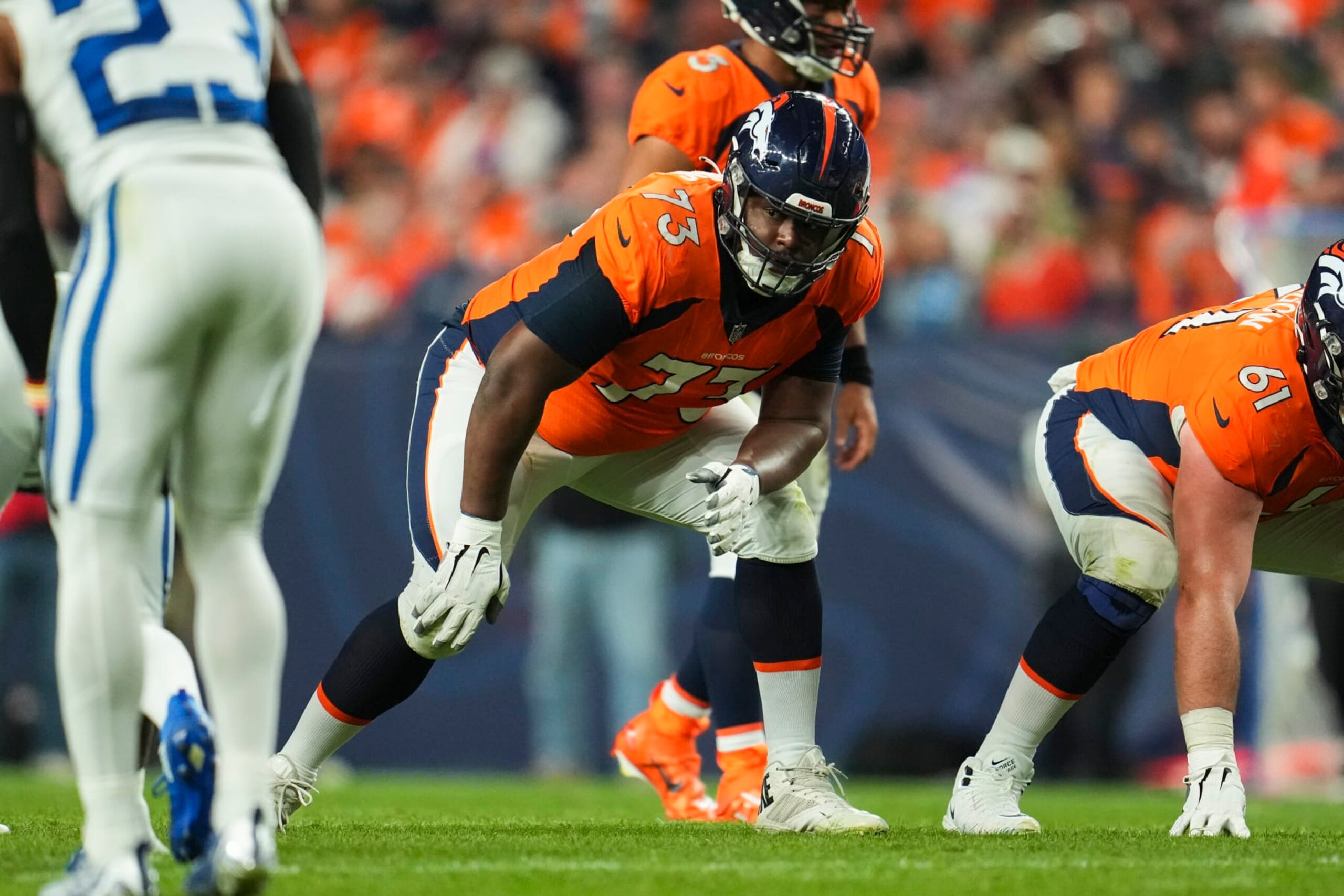 DENVER, CO - OCTOBER 06: Cameron Fleming #73 of the Denver Broncos gets set against the Indianapolis Colts at Empower Field at Mile High on October 6, 2022 in Denver, Texas. (Photo by Cooper Neill/Getty Images)
