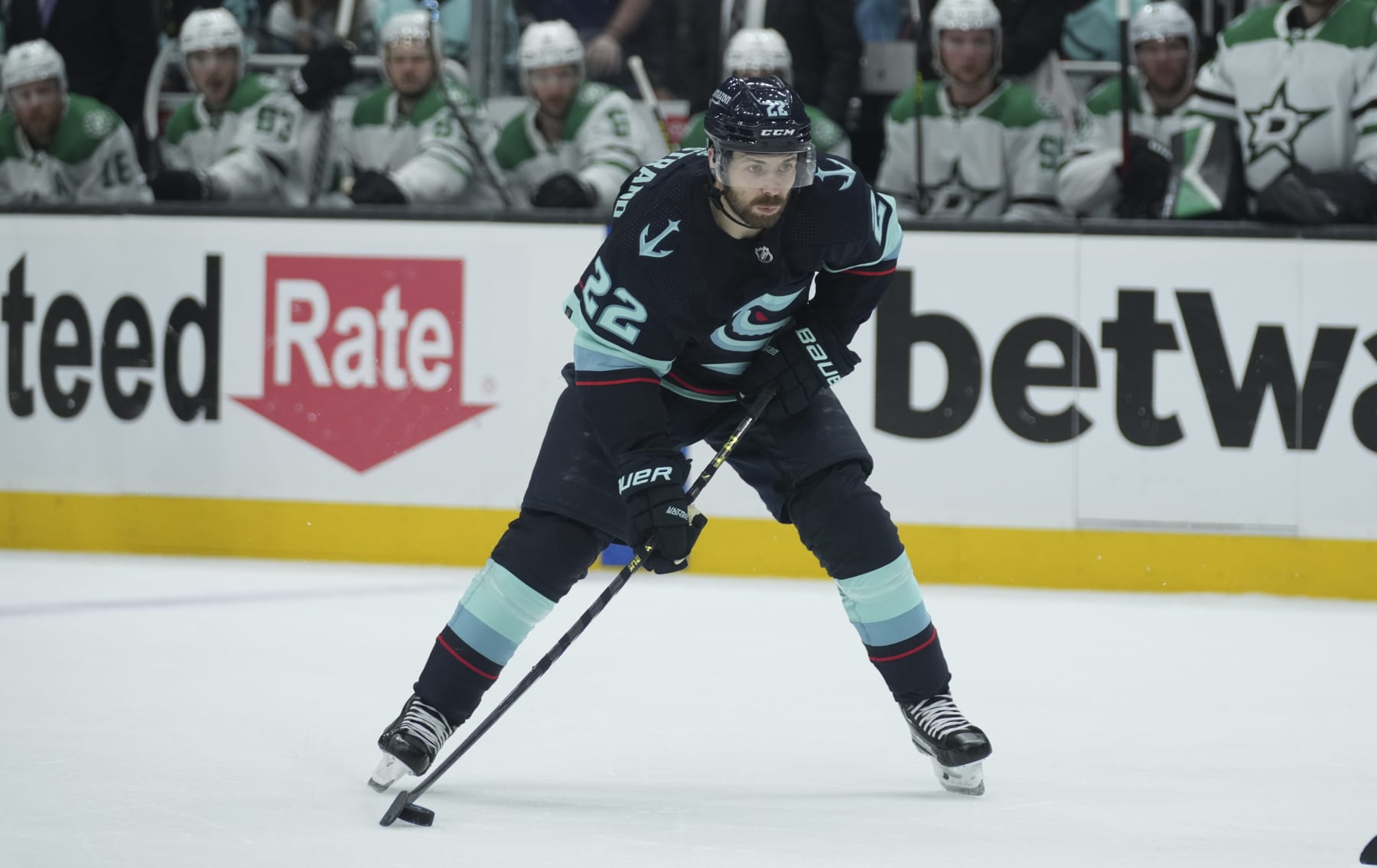 SEATTLE, WA - MAY 07: Seattle Kraken right wing Oliver Bjorkstrand (22) handles the puck during an NHL playoff game between the Dallas Stars and the Seattle Kraken on May 7, 2023 at Climate Pledge Arena in Seattle, WA. (Photo by Jeff Halstead/Icon Sportswire via Getty Images)