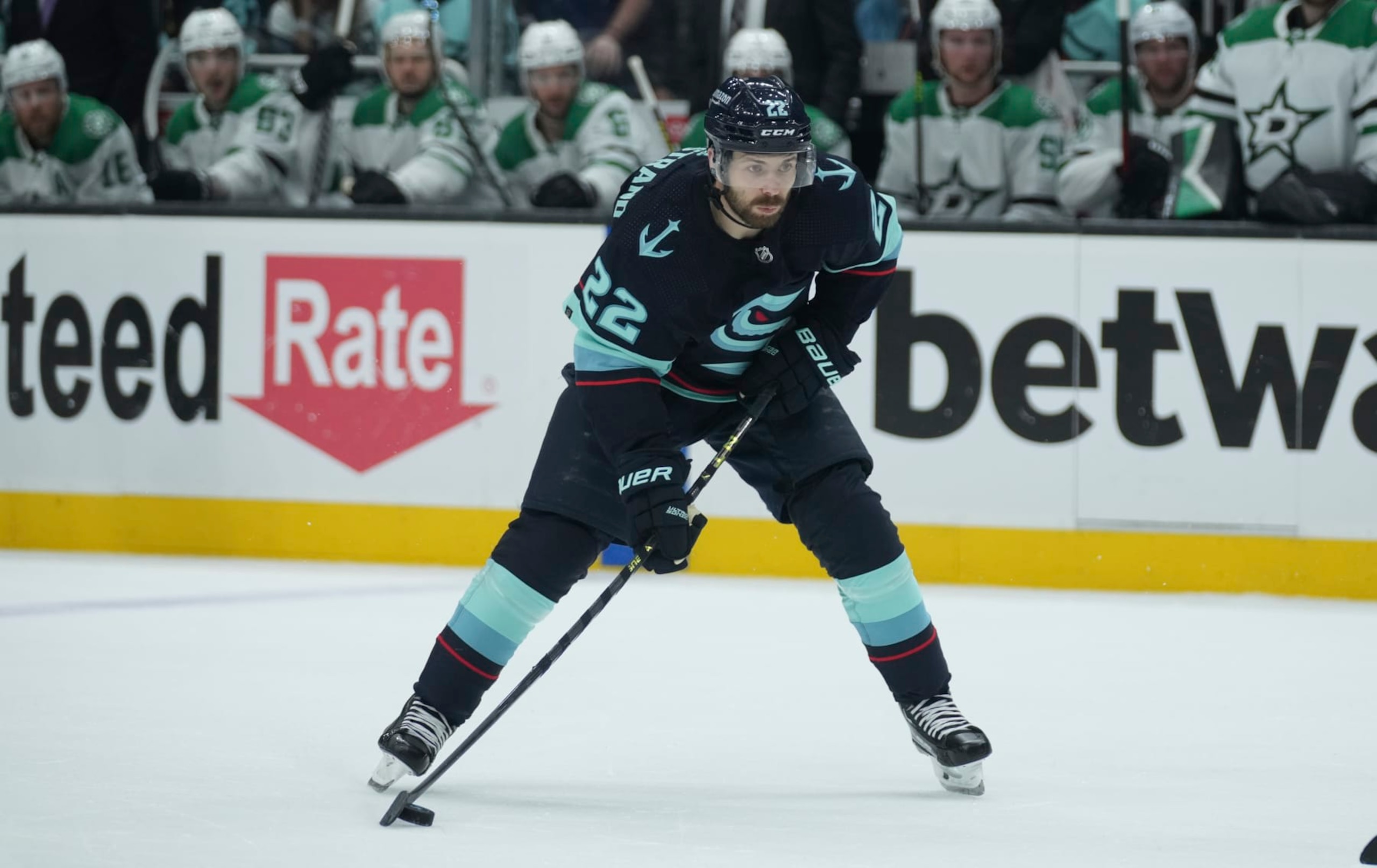 SEATTLE, WA - MAY 07: Seattle Kraken right wing Oliver Bjorkstrand (22) handles the puck during an NHL playoff game between the Dallas Stars and the Seattle Kraken on May 7, 2023 at Climate Pledge Arena in Seattle, WA. (Photo by Jeff Halstead/Icon Sportswire via Getty Images)
