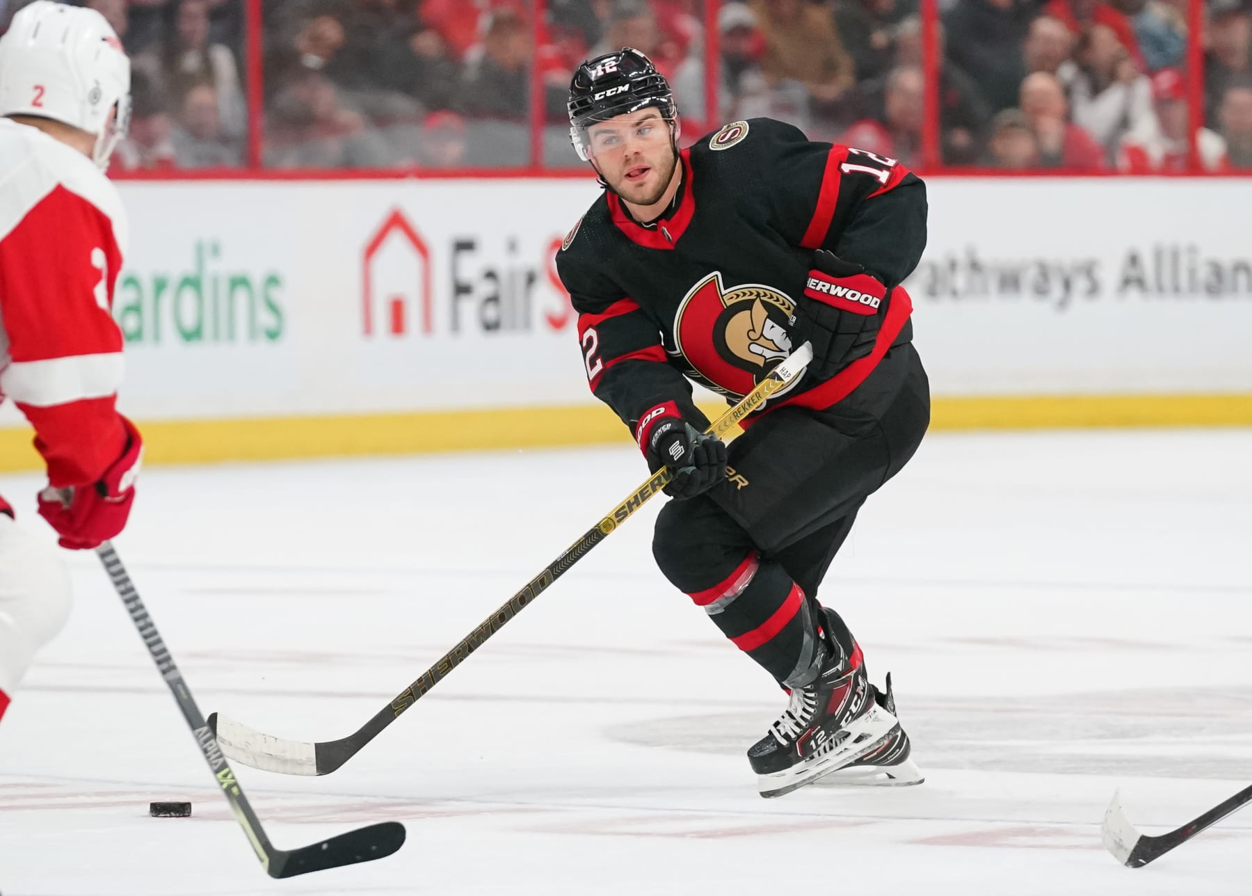 OTTAWA, CANADA - FEBRUARY 27:  Alex DeBrincat #12 of the Ottawa Senators skates against the Detroit Red Wings at Canadian Tire Centre on February 27, 2023 in Ottawa, Ontario, Canada.  (Photo by André Ringuette/NHLI via Getty Images)