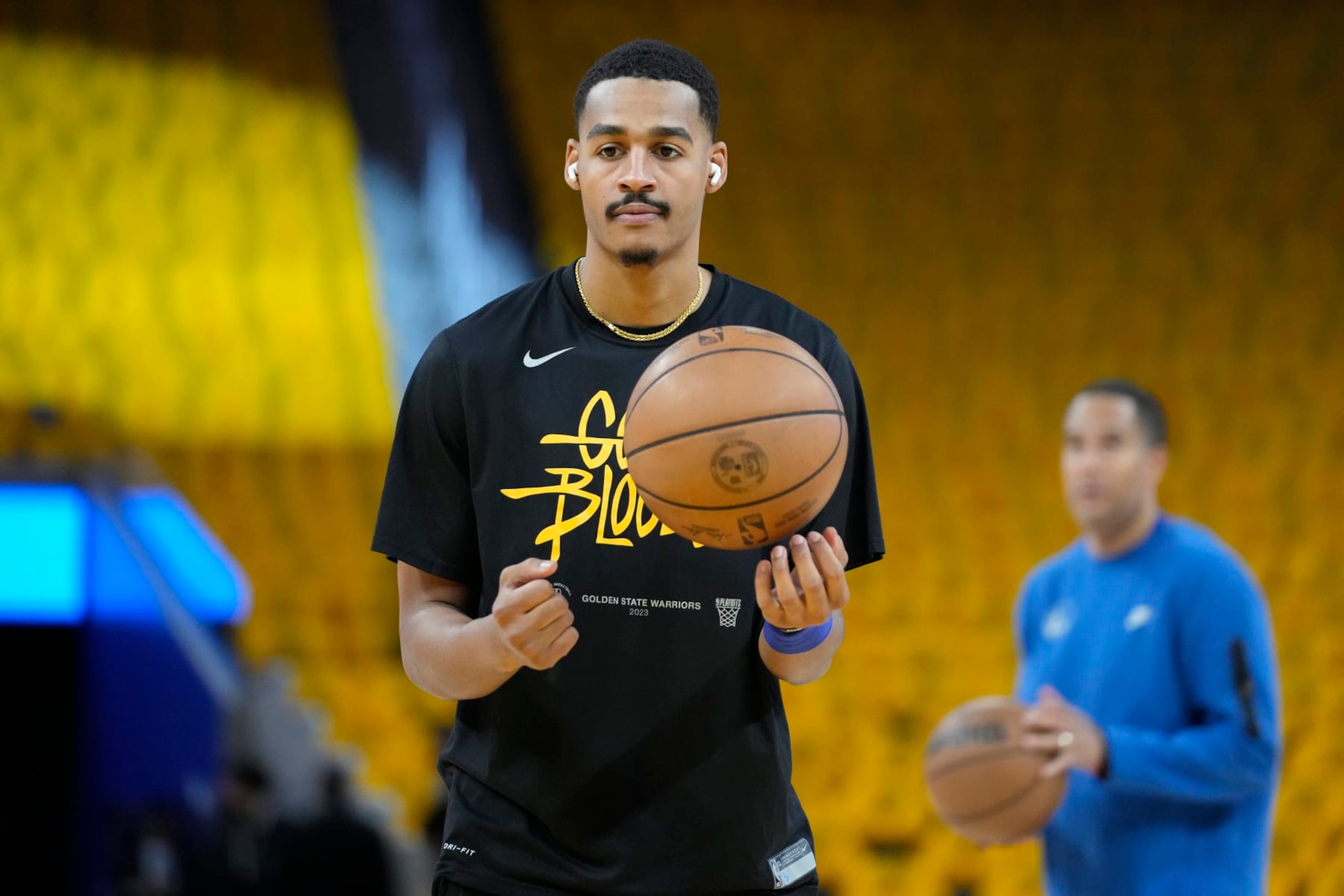 Golden State Warriors guard Jordan Poole warms up before Game 2 of an NBA basketball Western Conference semifinal game against the Los Angeles Lakers, Thursday, May 4, 2023, in San Francisco. (AP Photo/Godofredo A. Vásquez)