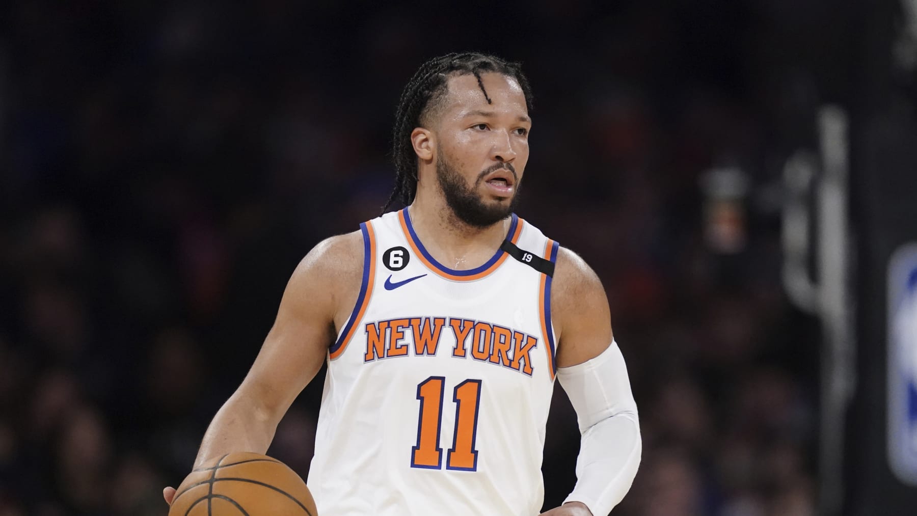 New York Knicks guard Jalen Brunson (11) dribbles up the court during the second half of Game 1 in the NBA basketball Eastern Conference semifinals playoff series against the Miami Heat, Sunday, April 30, 2023, in New York. (AP Photo/John Minchillo)