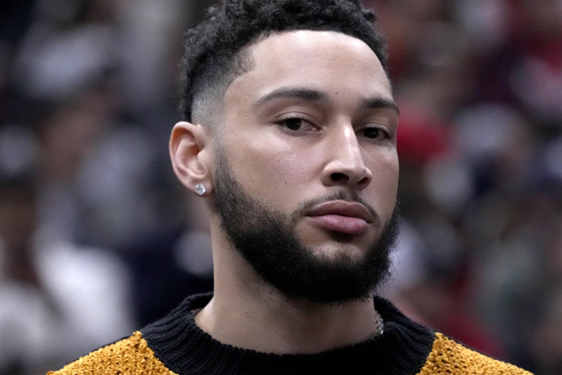 Brooklyn Nets' Ben Simmons sits on the bench during an NBA basketball game against the Chicago Bulls Friday, Feb. 24, 2023, in Chicago. (AP Photo/Charles Rex Arbogast)