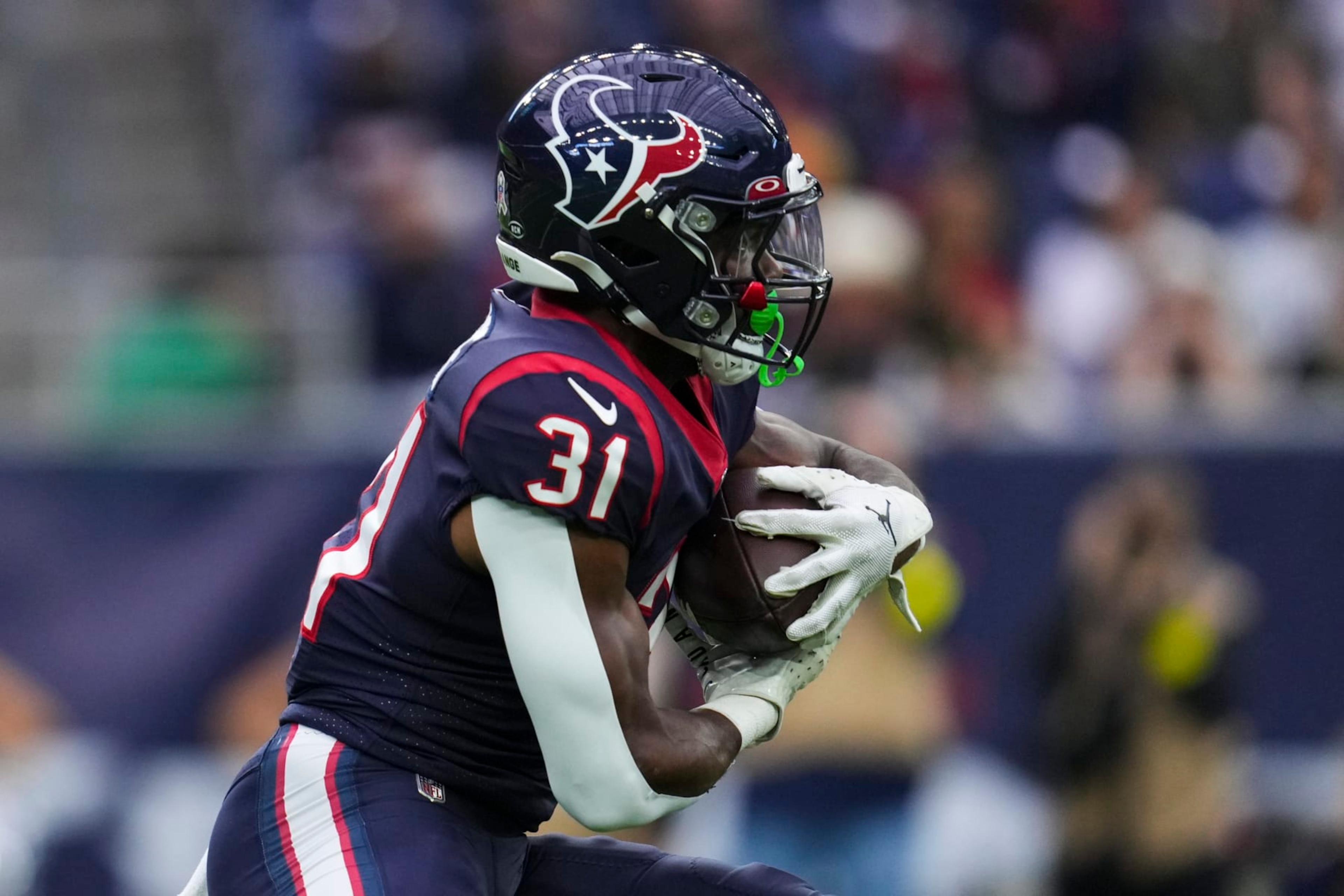 HOUSTON, TX - NOVEMBER 20: Dameon Pierce #31 of the Houston Texans runs the ball against the Washington Commanders at NRG Stadium on November 20, 2022 in Houston, Texas. (Photo by Cooper Neill/Getty Images) HOUSTON, TX - NOVEMBER 20: Dameon Pierce #31 of the Houston Texans runs the ball against the Washington Commanders at NRG Stadium on November 20, 2022 in Houston, Texas. (Photo by Cooper Neill/Getty Images)