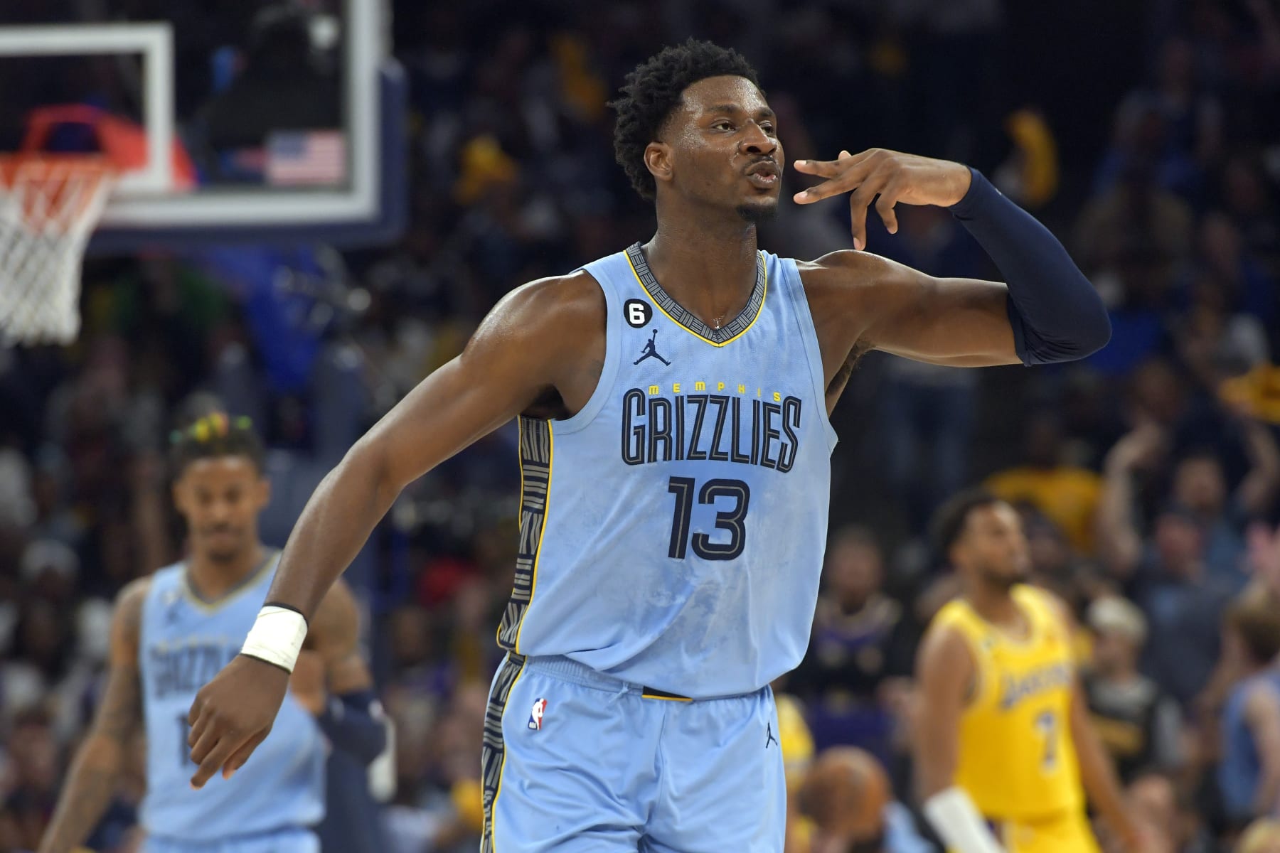 Memphis Grizzlies forward Jaren Jackson Jr. (13) reacts after scoring against the Los Angeles Lakers during the second half of Game 5 in a first-round NBA basketball playoff series Wednesday, April 26, 2023, in Memphis, Tenn. (AP Photo/Brandon Dill)