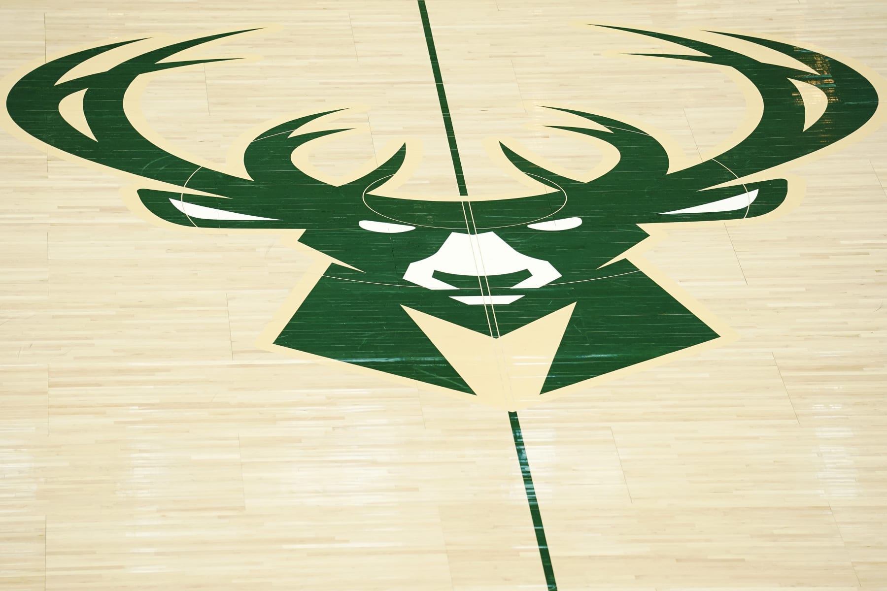 MILWAUKEE, WISCONSIN - MARCH 06: A general view of the Milwaukee Bucks logo at center court before a game against the Phoenix Suns at Fiserv Forum on March 06, 2022 in Milwaukee, Wisconsin. NOTE TO USER: User expressly acknowledges and agrees that, by downloading and or using this photograph, User is consenting to the terms and conditions of the Getty Images License Agreement. (Photo by Patrick McDermott/Getty Images)