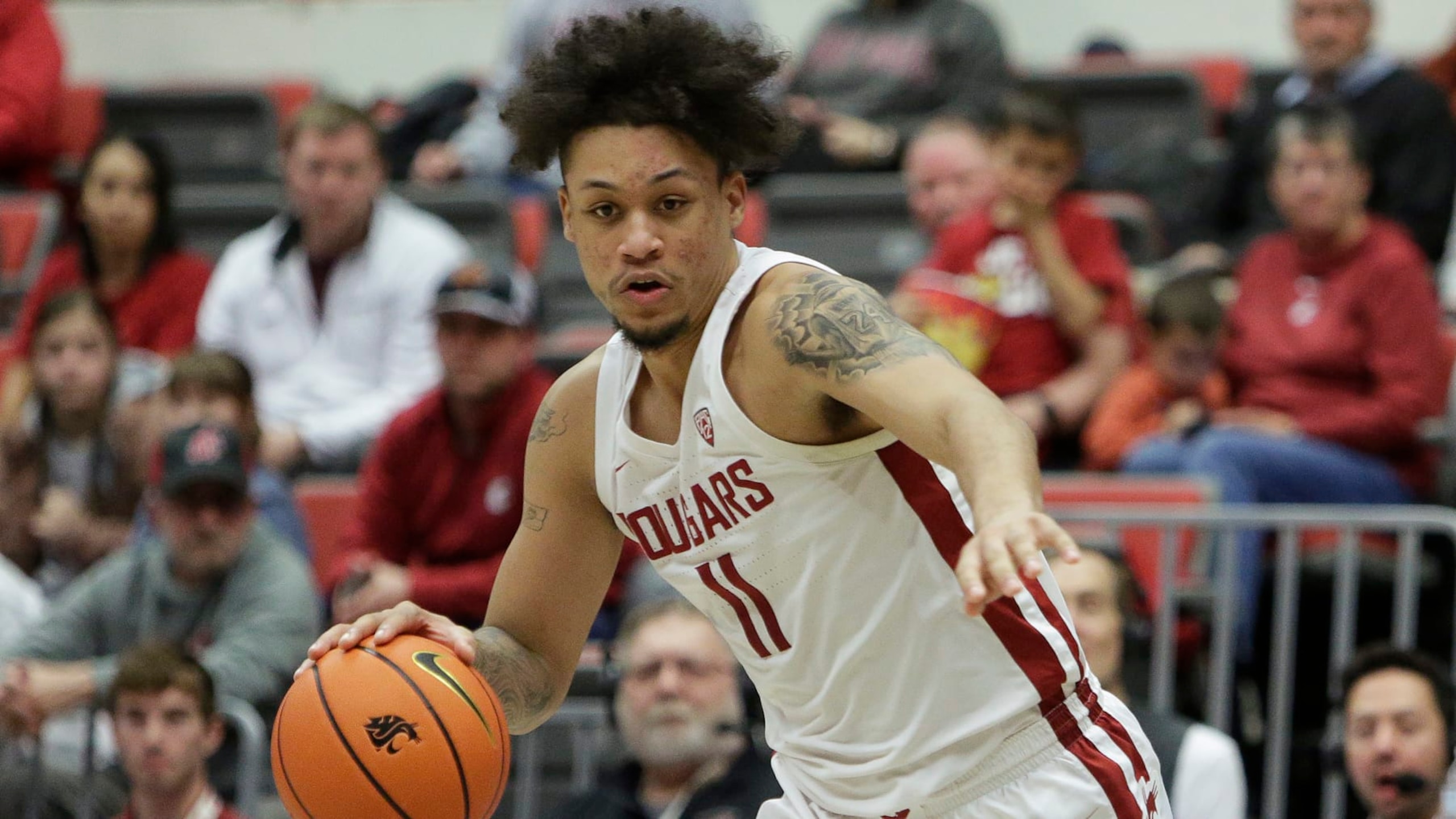 Washington State forward DJ Rodman drives during the second half of an NCAA college basketball game against Arizona State, Saturday, Jan. 28, 2023, in Pullman, Wash. (AP Photo/Young Kwak)