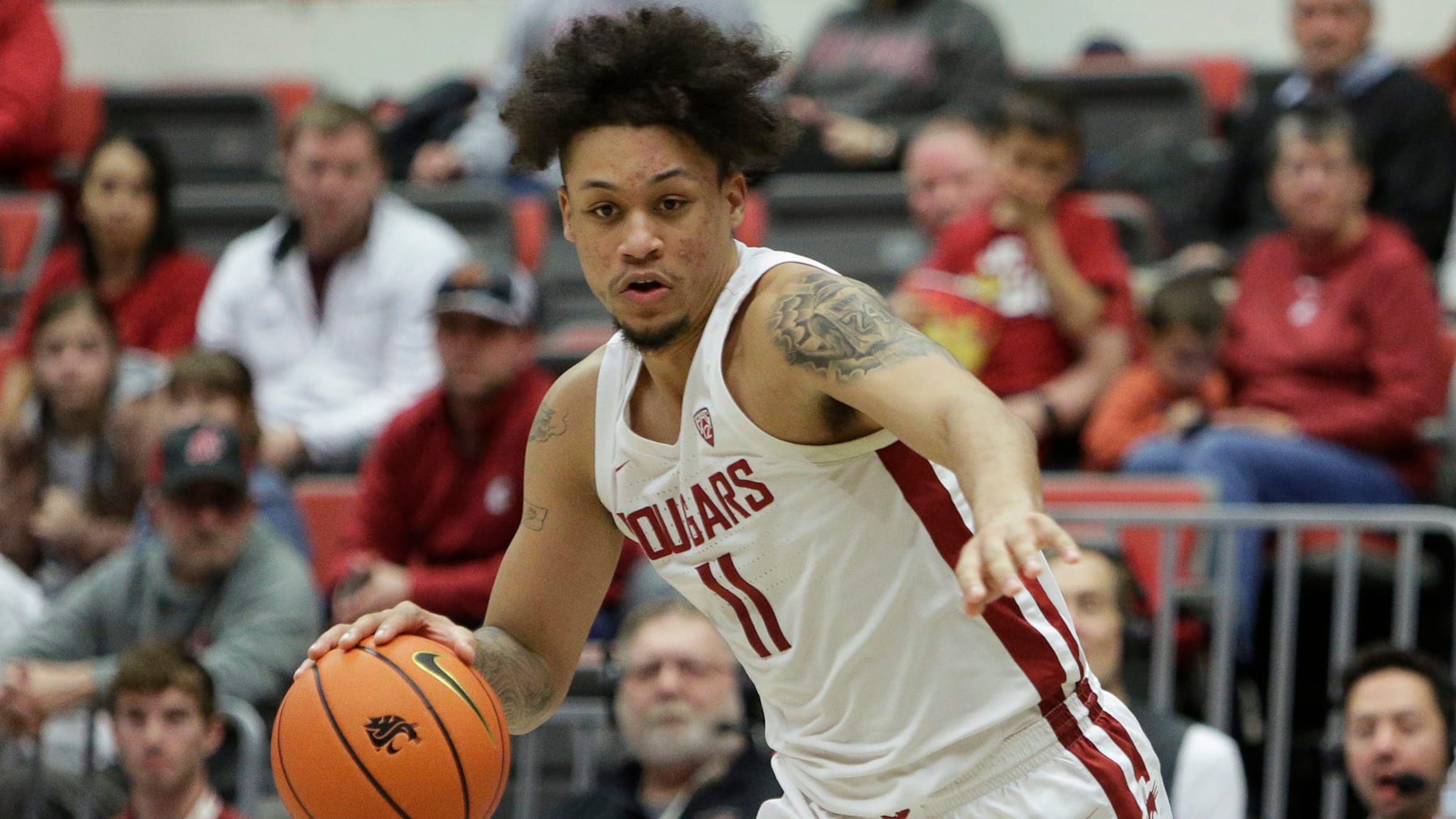 Washington State forward DJ Rodman drives during the second half of an NCAA college basketball game against Arizona State, Saturday, Jan. 28, 2023, in Pullman, Wash. (AP Photo/Young Kwak)