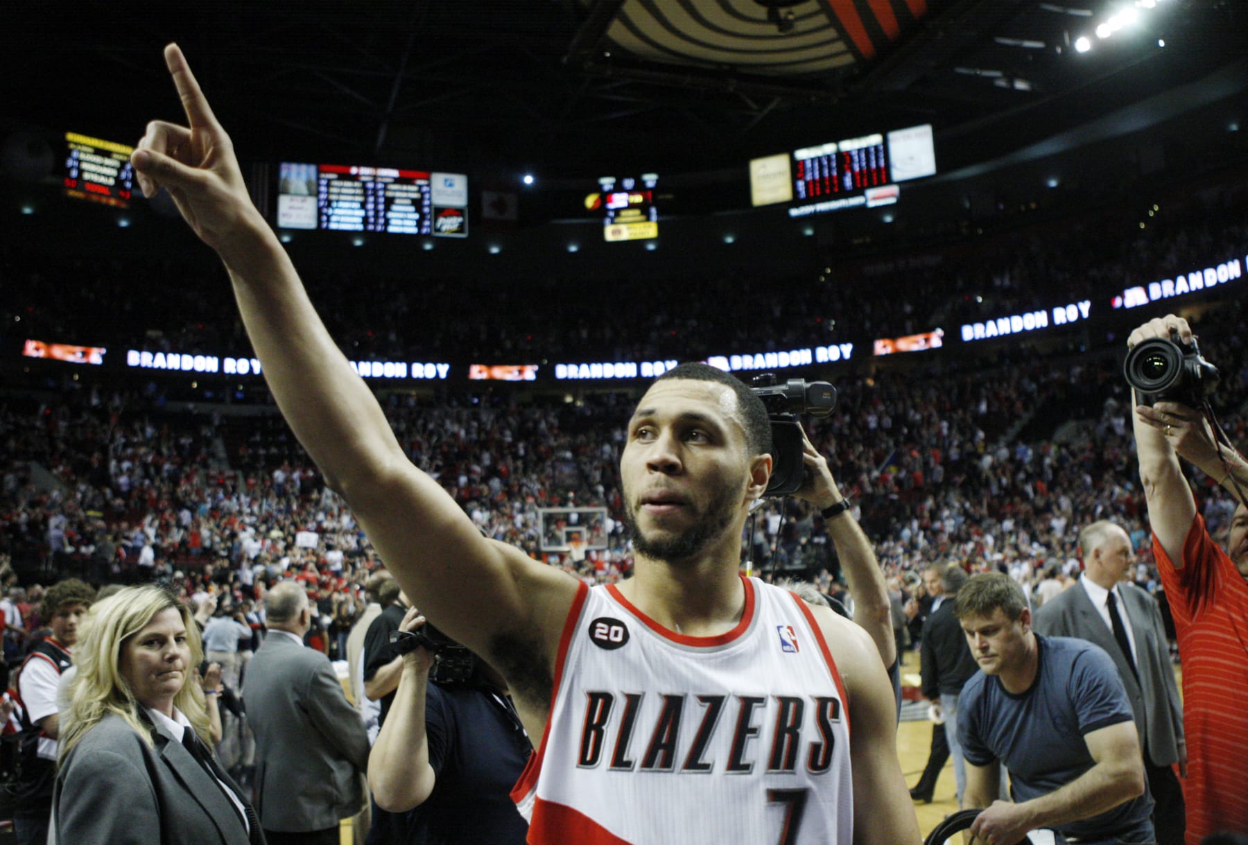 FILE - This April 23, 2011, file photo, shows Portland Trail Blazers' Brandon Roy (7) pointing to the crowd after defeating the Dallas Mavericks 84-82 in Game 4 of their NBA basketball first-round playoff series, in Portland, Ore. The Trail Blazers will not discuss reports that All-Star guard Brandon Roy plans to seek medical retirement because of his knees. Roy's agent also did not respond to a request for comment on any retirement plans, first reported by ESPN.com early Friday. Roy, a four-year veteran who helped the team shed its "Jail Blazers" reputation, has been dogged by knee injuries and surgeries. He has said he lacks cartilage between the bones in both knees. (AP Photo/Rick Bowmer, File)