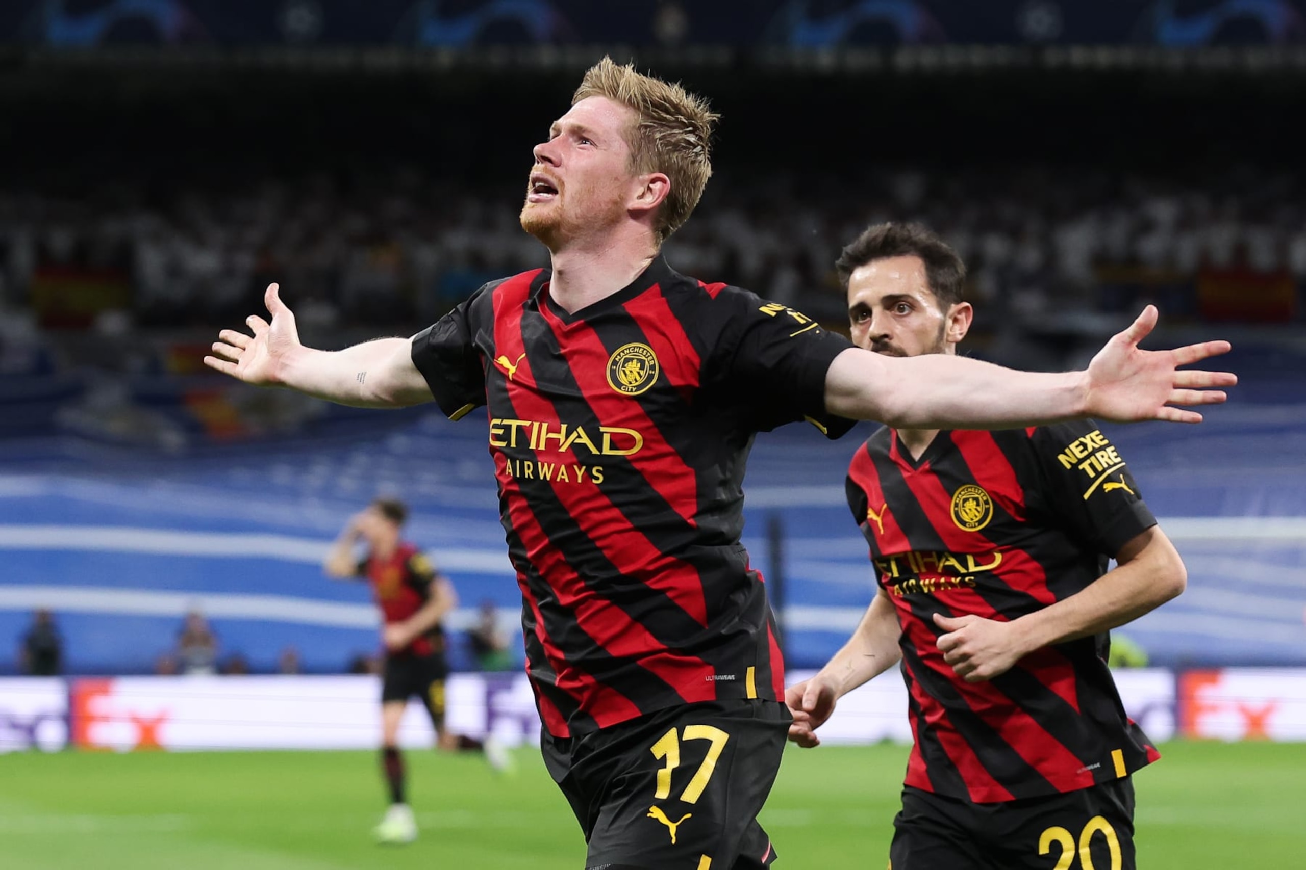 MADRID, SPAIN - MAY 09: Kevin De Bruyne of Manchester City celebrates after scoring his side's first goal during the UEFA Champions League semi-final first leg match between Real Madrid and Manchester City FC at Estadio Santiago Bernabeu on May 09, 2023 in Madrid, Spain. (Photo by Alex Livesey - Danehouse/Getty Images)