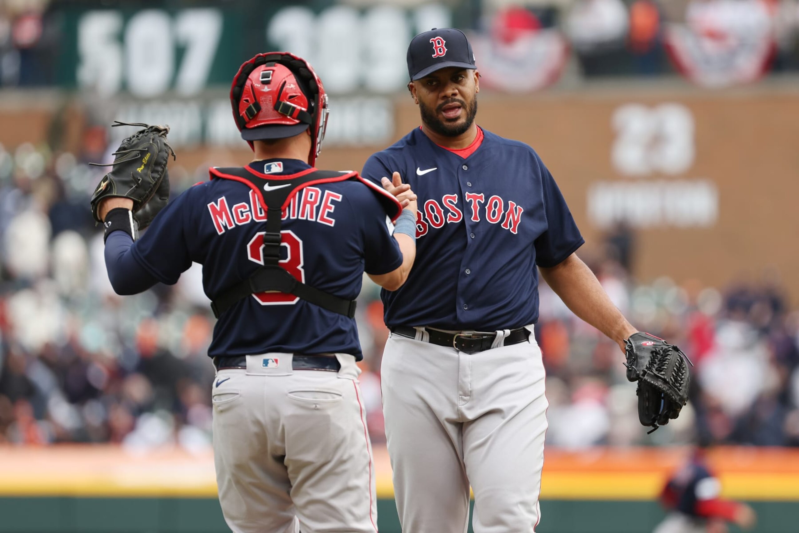 DETROIT, MICHIGAN - APRIL 06: Kenley Jansen #74 of the Boston Red Sox celebrates a 6-3 win over the Detroit Tigers with Reese McGuire during opening day at Comerica Park on April 06, 2023 in Detroit, Michigan. (Photo by Gregory Shamus/Getty Images)