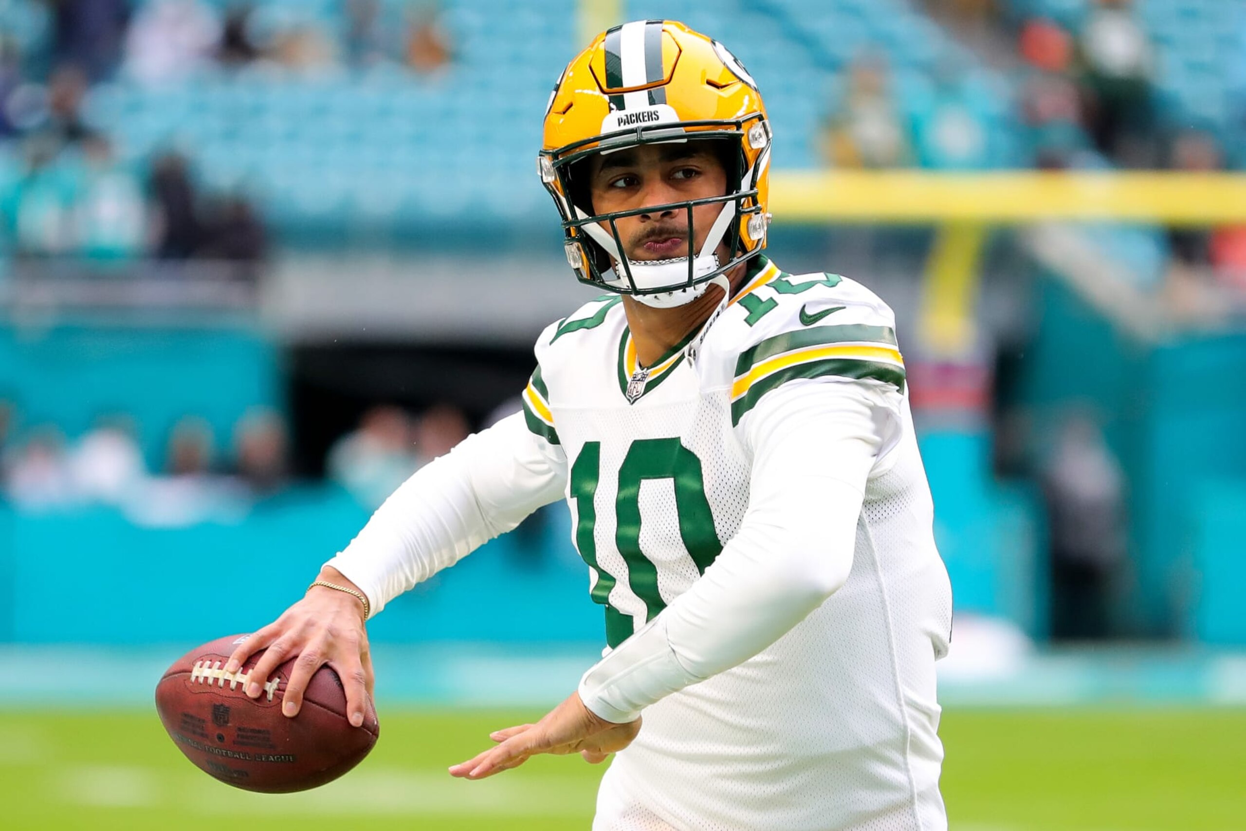MIAMI GARDENS, FLORIDA - DECEMBER 25: Jordan Love #10 of the Green Bay Packers warms up prior to a game against the Miami Dolphins at Hard Rock Stadium on December 25, 2022 in Miami Gardens, Florida. (Photo by Megan Briggs/Getty Images)