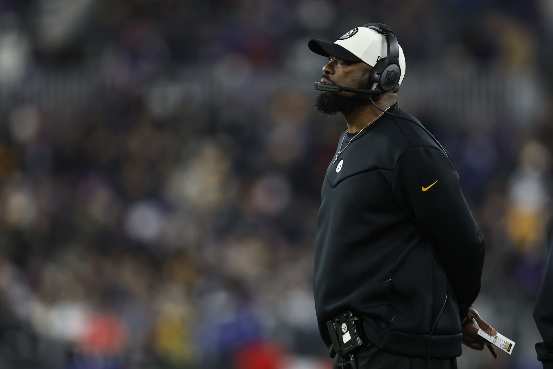 BALTIMORE, MARYLAND - JANUARY 01: Head coach Mike Tomlin of the Pittsburgh Steelers looks on during an NFL football game between the Baltimore Ravens and the Pittsburgh Steelers at M&T Bank Stadium on January 01, 2023 in Baltimore, Maryland. (Photo by Michael Owens/Getty Images)