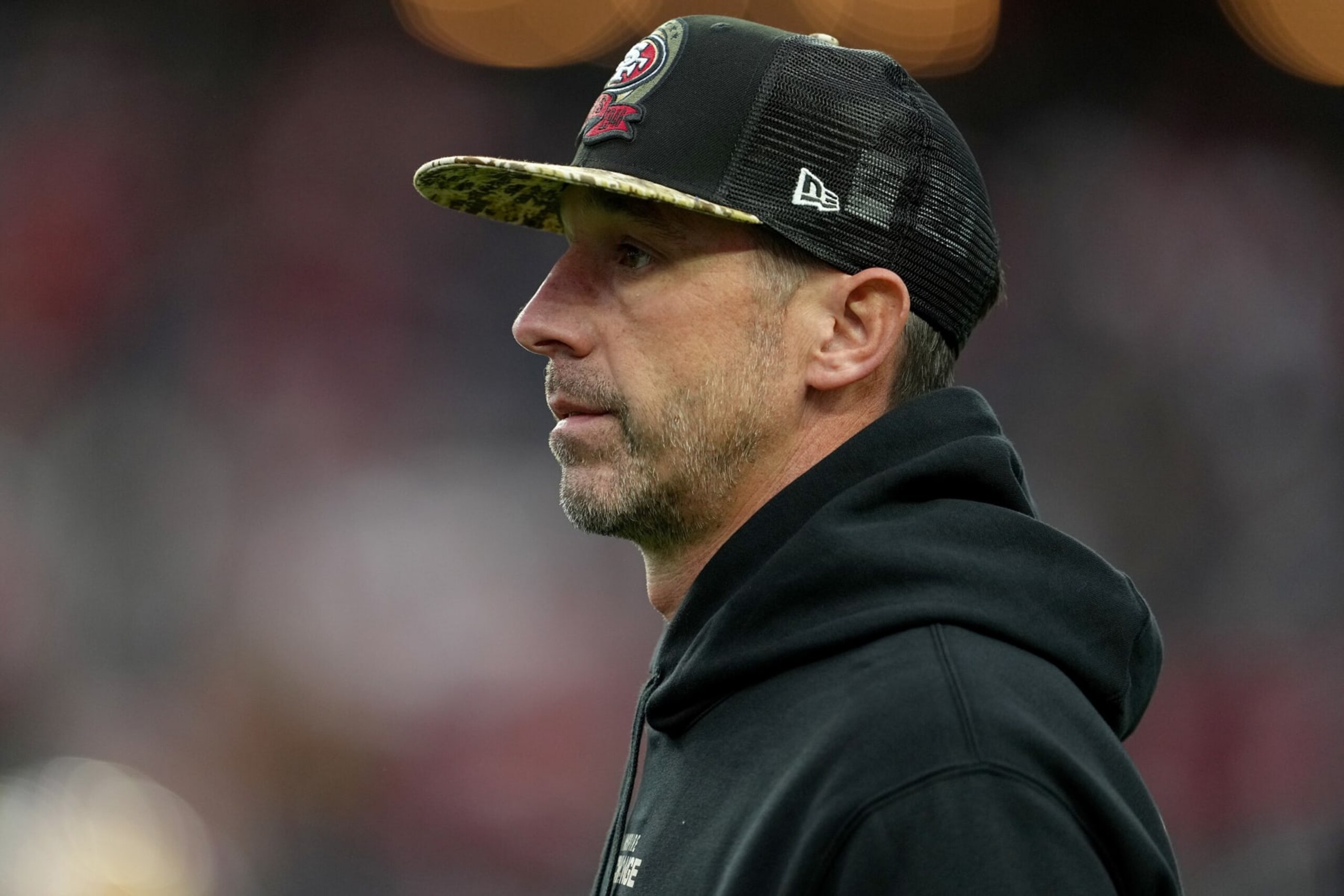 LAS VEGAS, NEVADA - JANUARY 01: Head coach Kyle Shanahan of the San Francisco 49ers walks onto the field for warm-ups against the Las Vegas Raiders at Allegiant Stadium on January 01, 2023 in Las Vegas, Nevada. (Photo by Jeff Bottari/Getty Images)