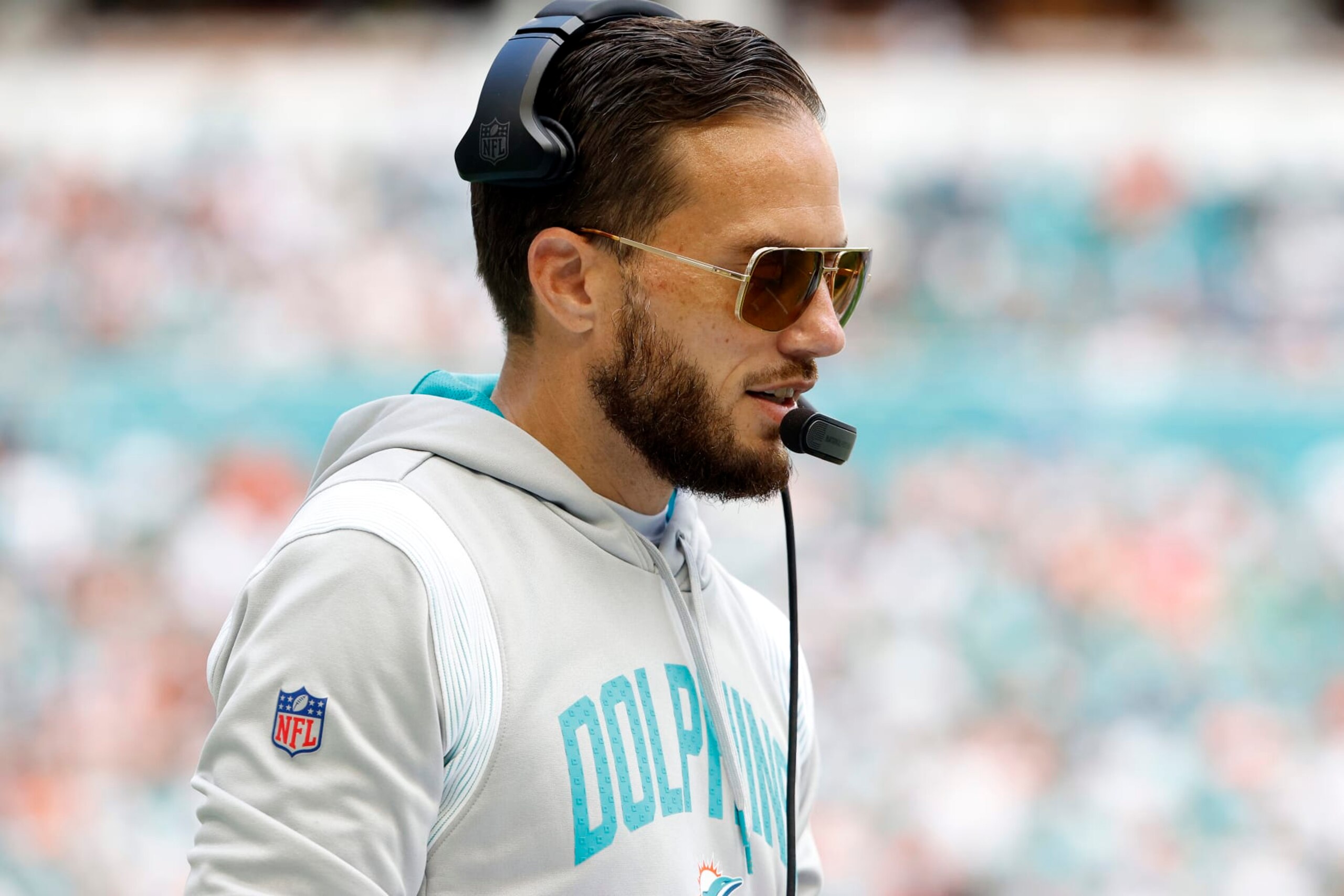 MIAMI GARDENS, FLORIDA - JANUARY 08:  Head coach Mike McDaniel of the Miami Dolphins coaches from the sidelines during the game against the New York Jets at Hard Rock Stadium on January 08, 2023 in Miami Gardens, Florida. (Photo by Cliff Hawkins/Getty Images)