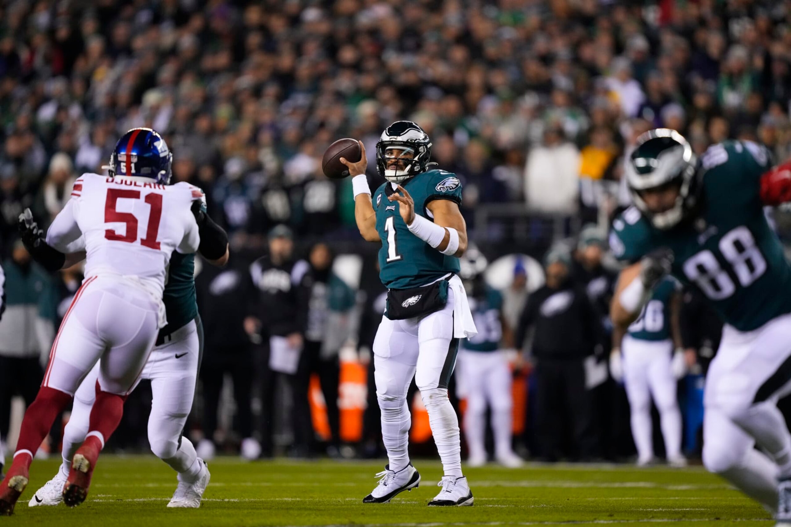 Philadelphia Eagles quarterback Jalen Hurts in action before an NFL divisional round playoff football game, Saturday, Jan. 21, 2023, in Philadelphia. (AP Photo/Matt Rourke)