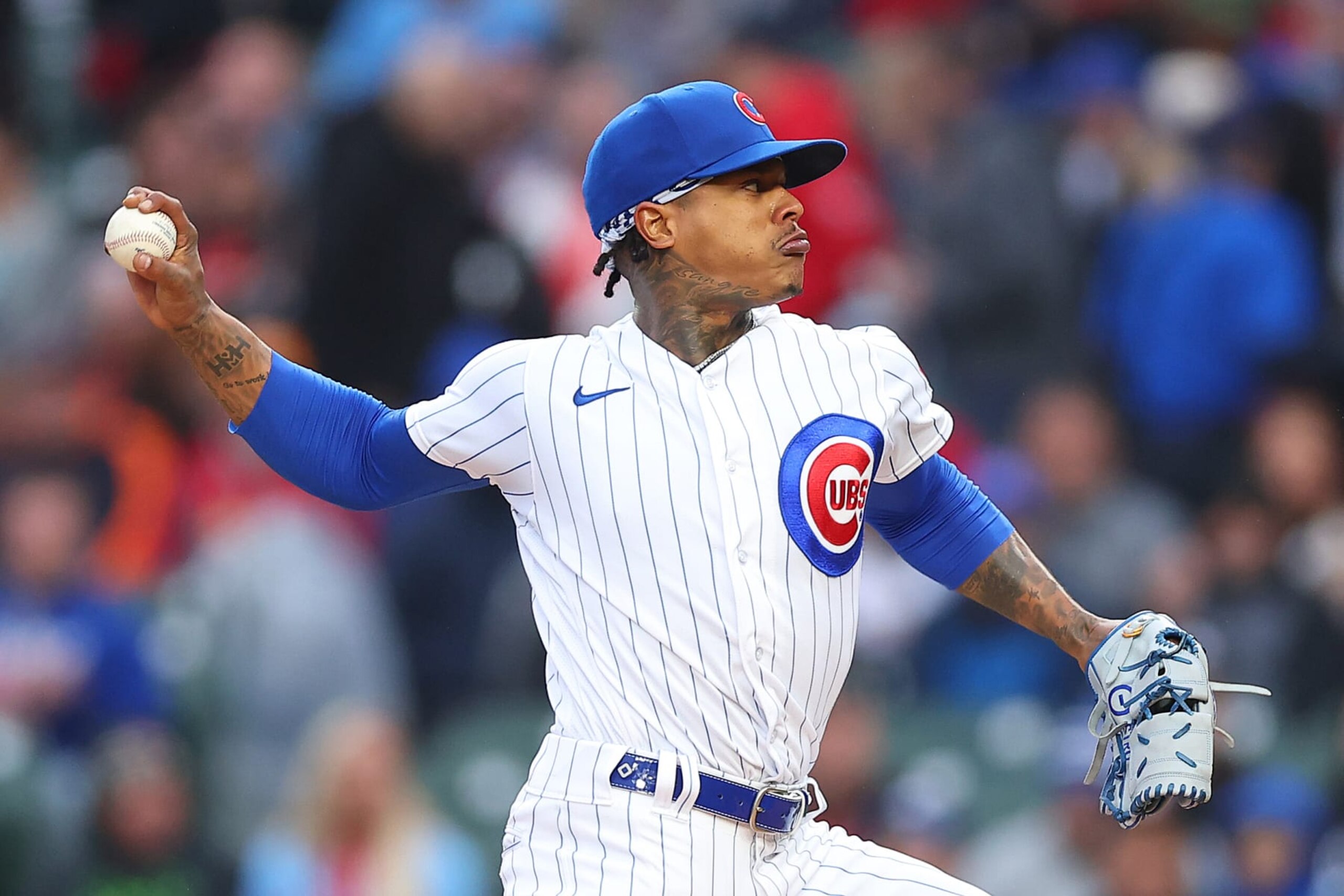 CHICAGO, ILLINOIS - MAY 08: Marcus Stroman #0 of the Chicago Cubs delivers a pitch during the first inning against the St. Louis Cardinals at Wrigley Field on May 08, 2023 in Chicago, Illinois. (Photo by Michael Reaves/Getty Images)